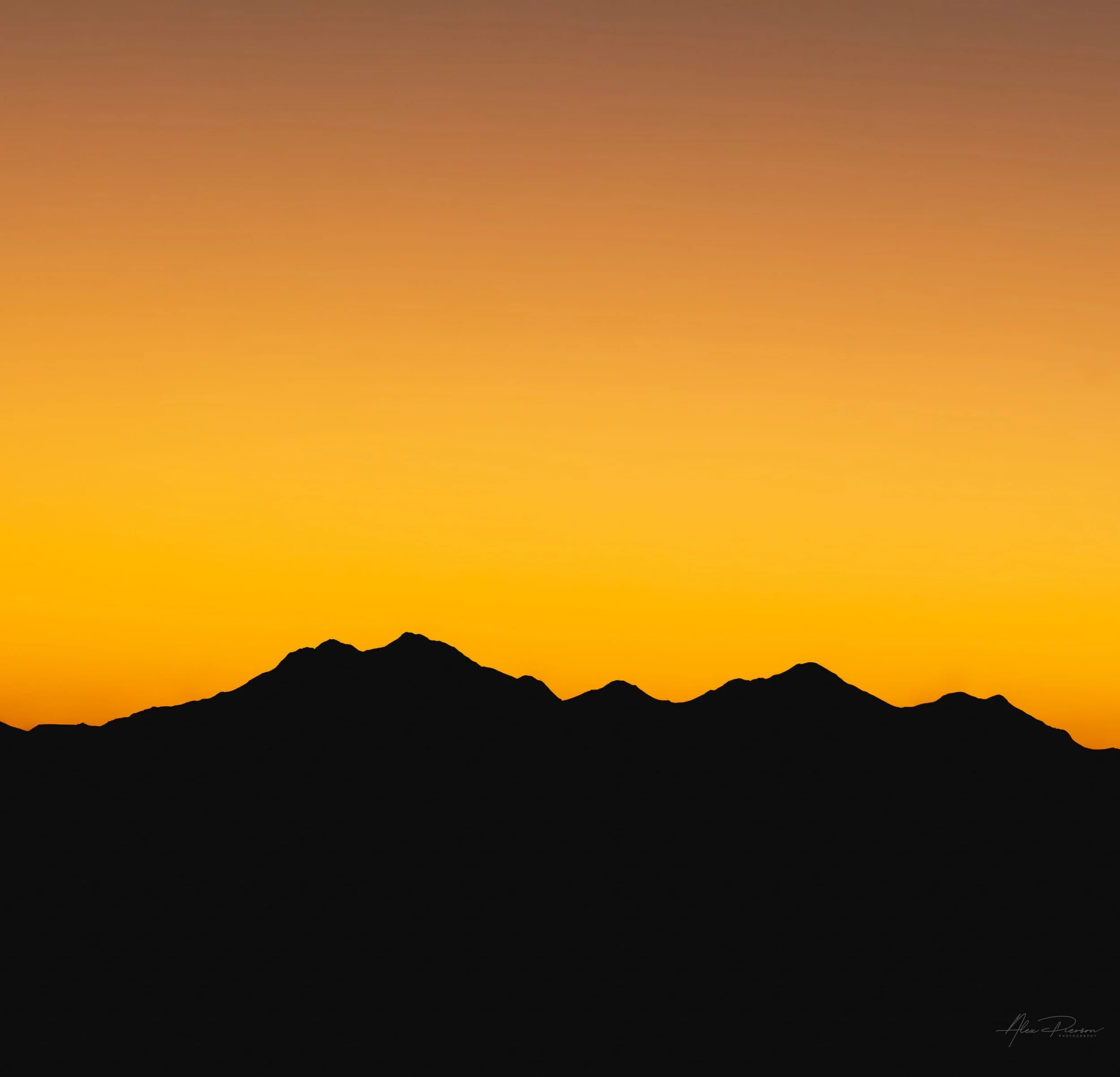 nevada-mountain-silhouette-sunset-orange-sky.jpg
