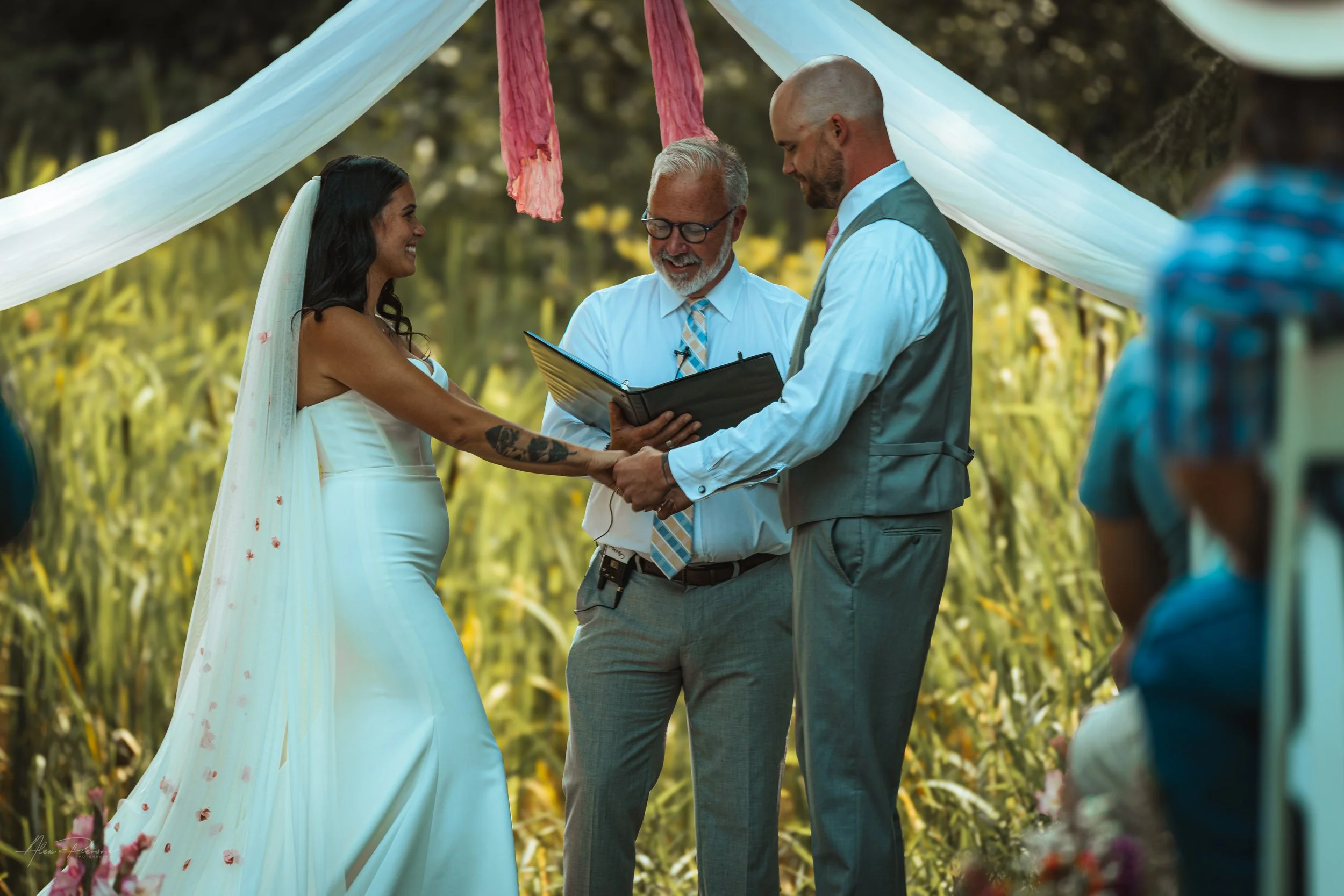 bride and groom saying vows during their wedding in Olympia, WA