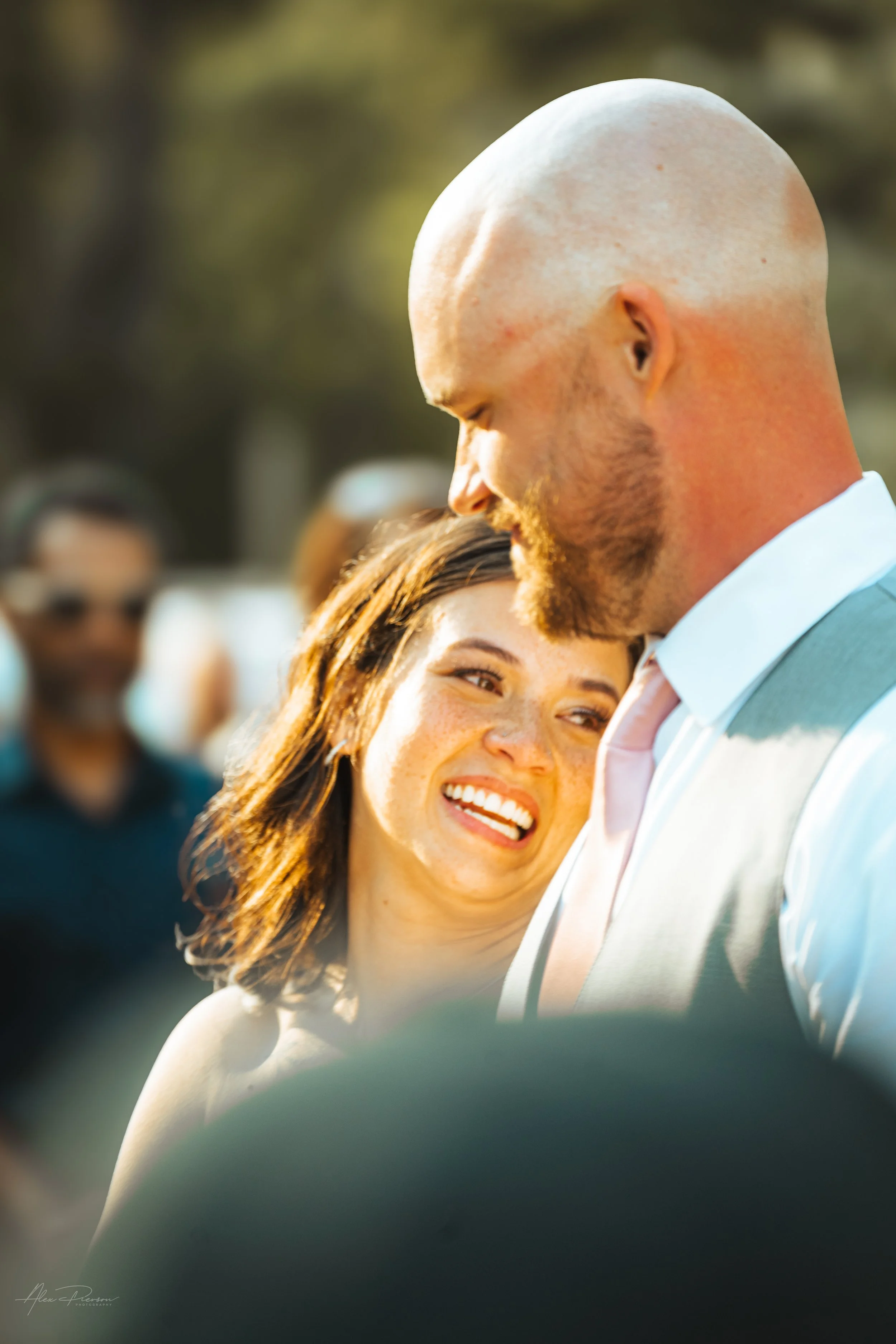 bride laughing with her new husband during their wedding in Olympia, wa