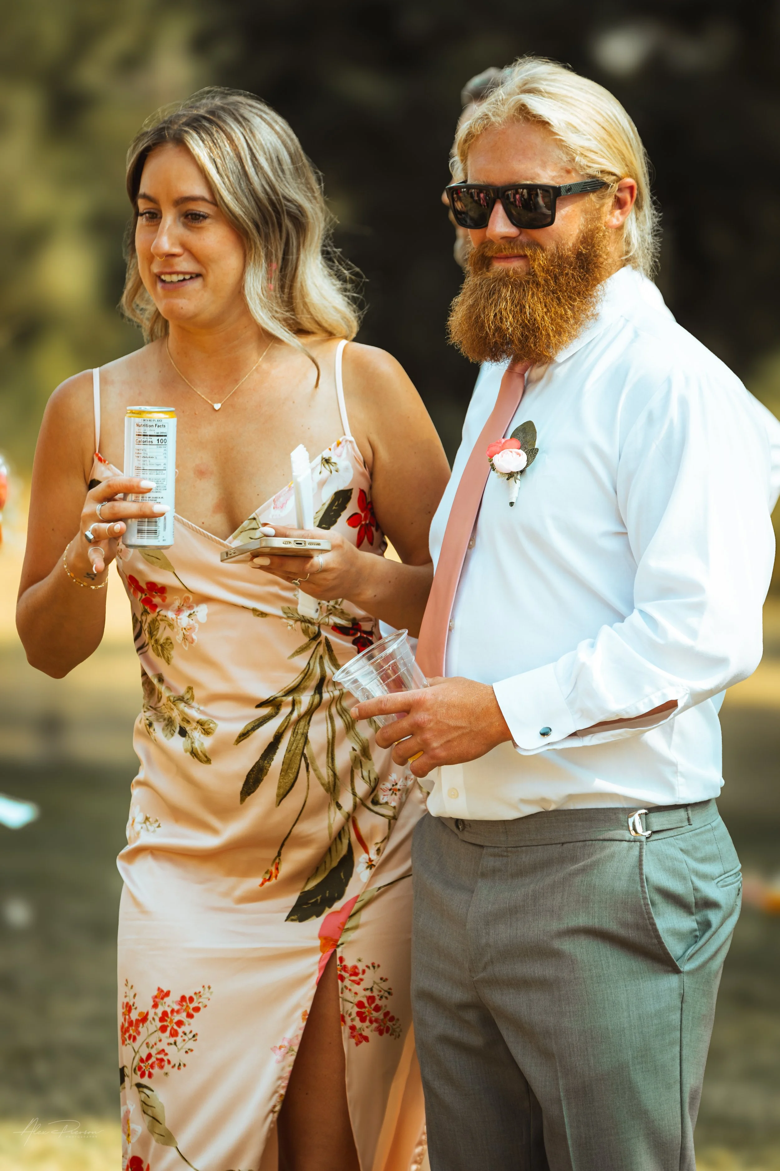groomsman and his partner at a wedding in Olympia, wa