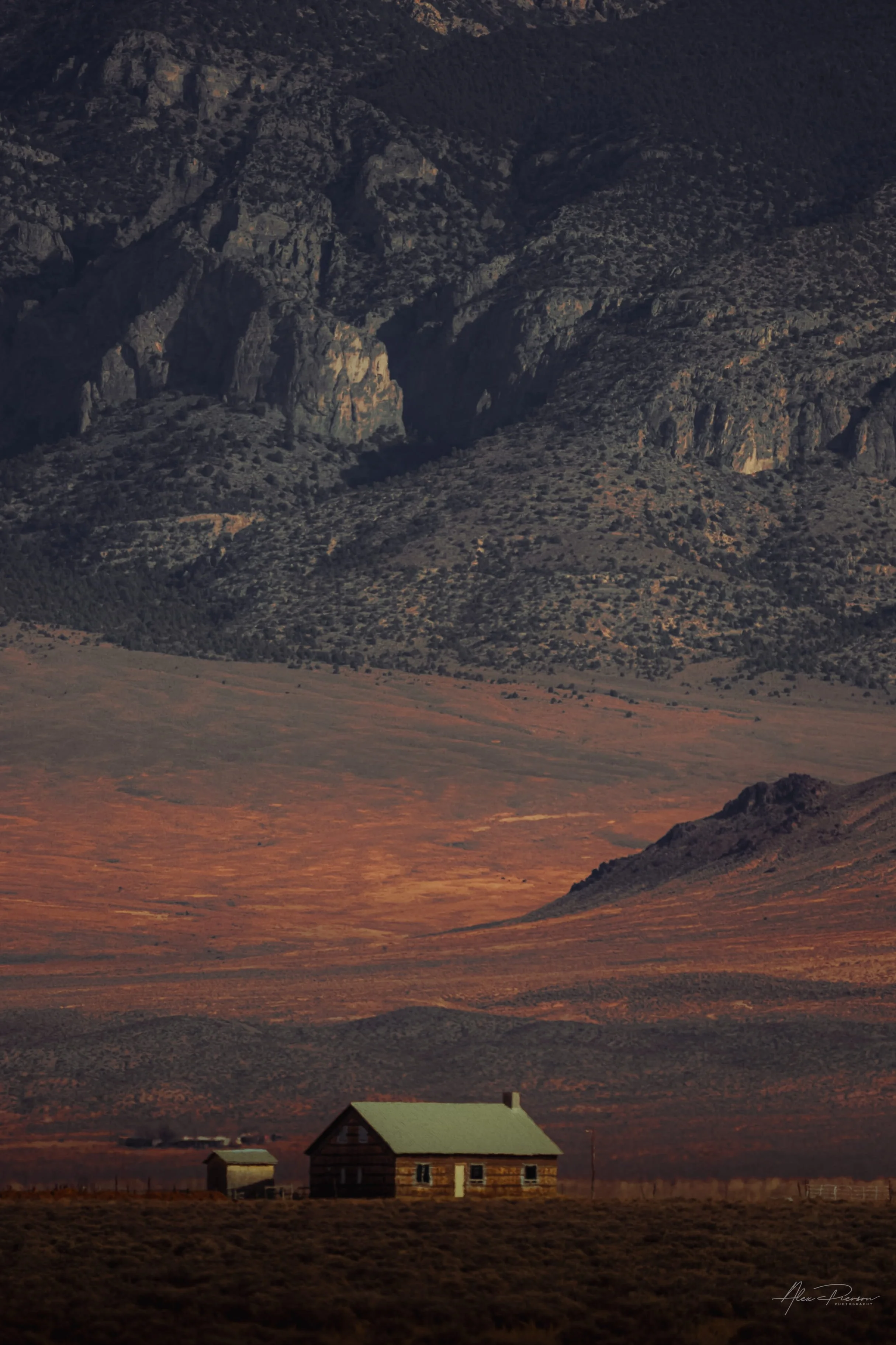 lonely-desert-cabin-nevada-mountainous-landscape.jpg