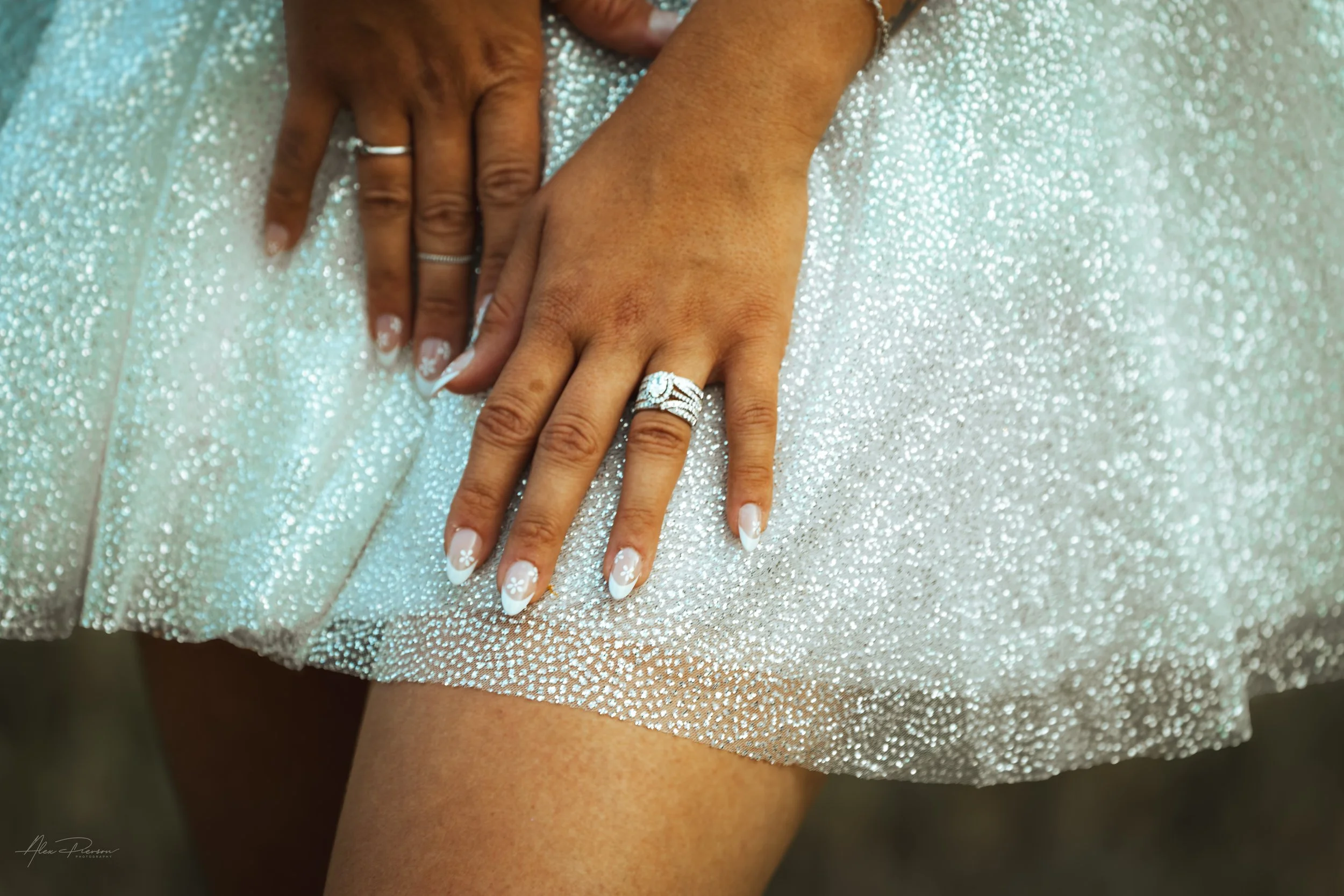 bride showing off her new ring in a wedding in Olympia, wa