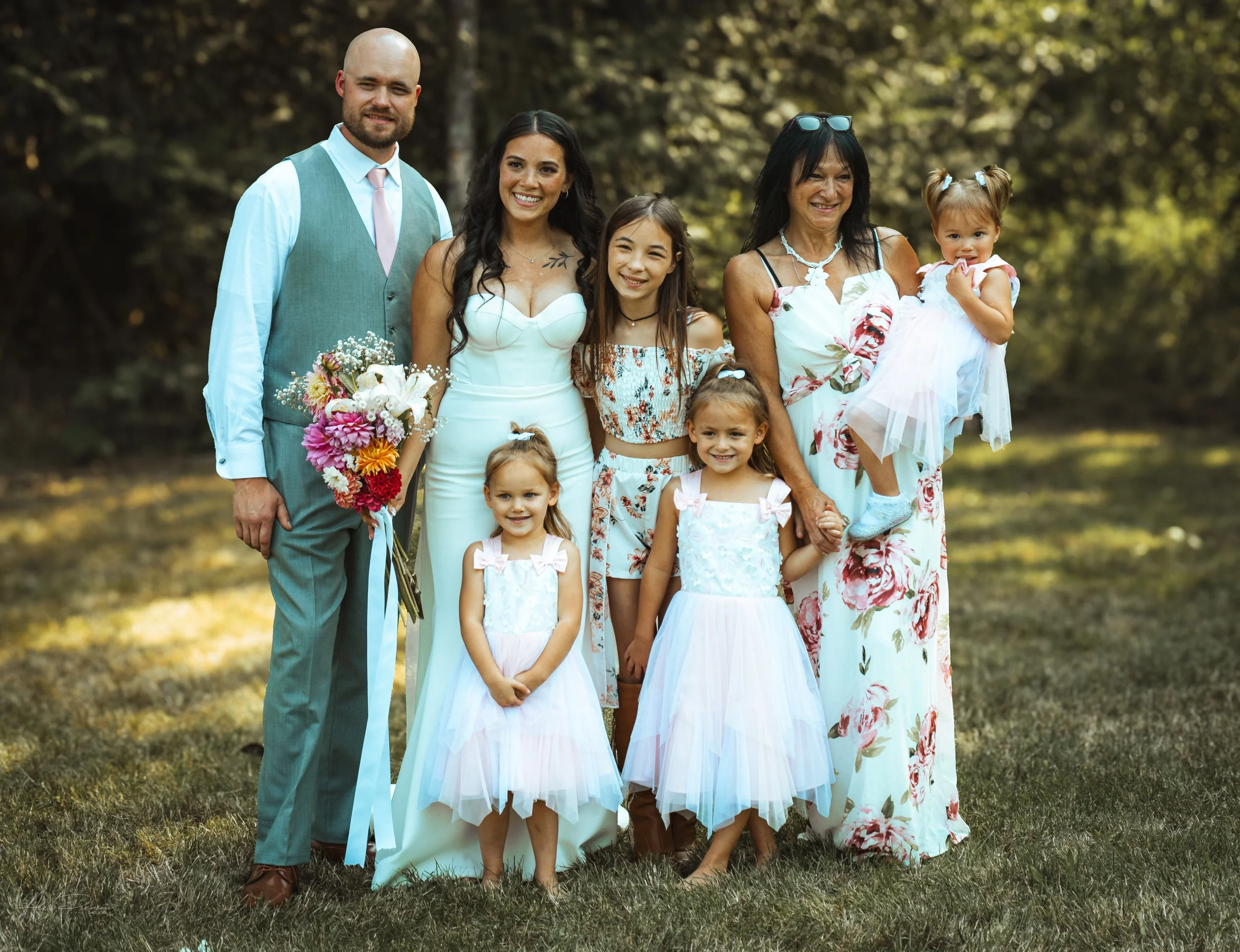group[ photo of the bride, groom, and guests during their wedding in Olympia, wa