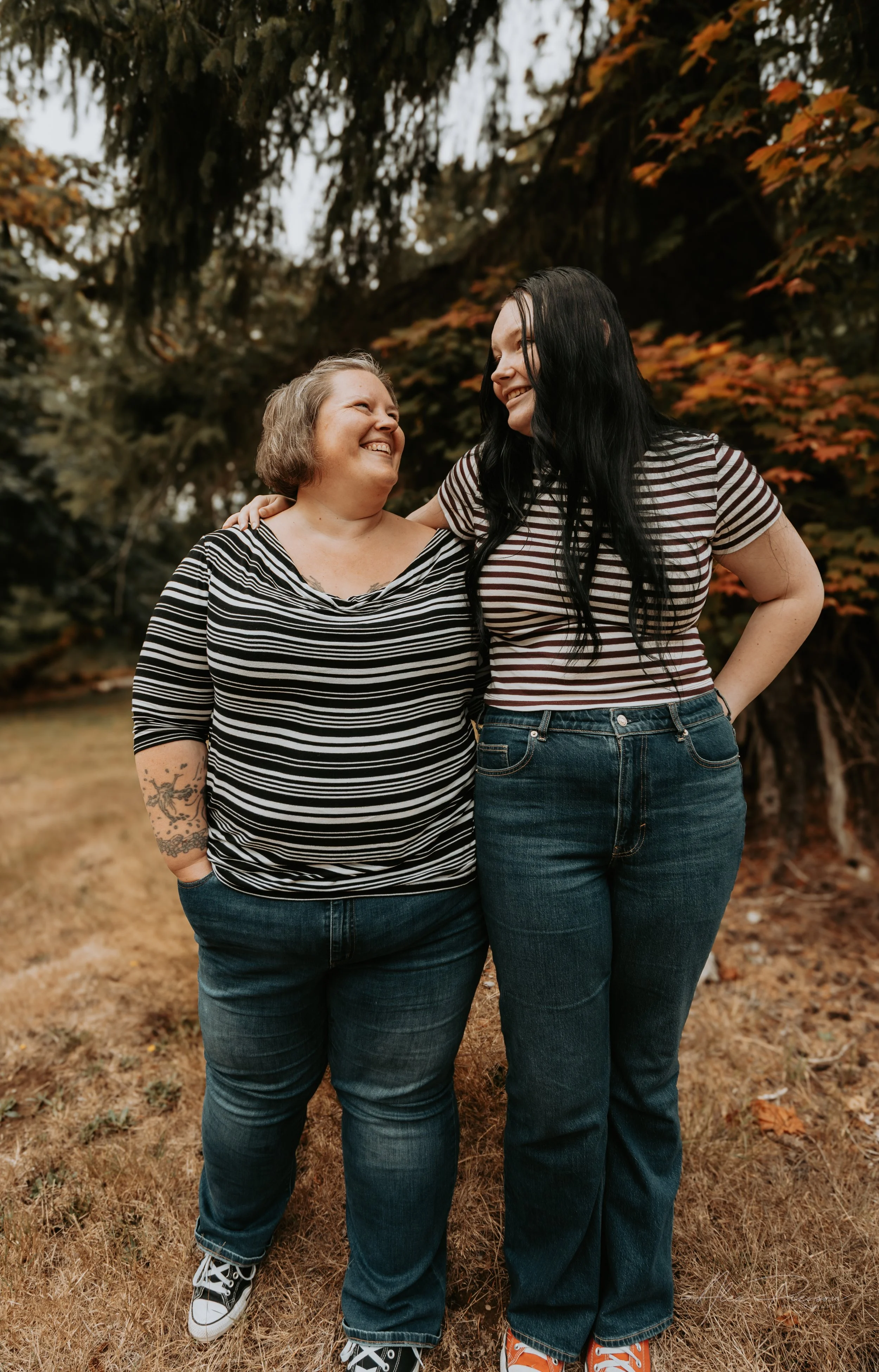 Mother and Daughter gazing at each other during a family photoshoot in their backyard in Montesano, WA- – Pacific Northwest lifestyle family and children's photography.