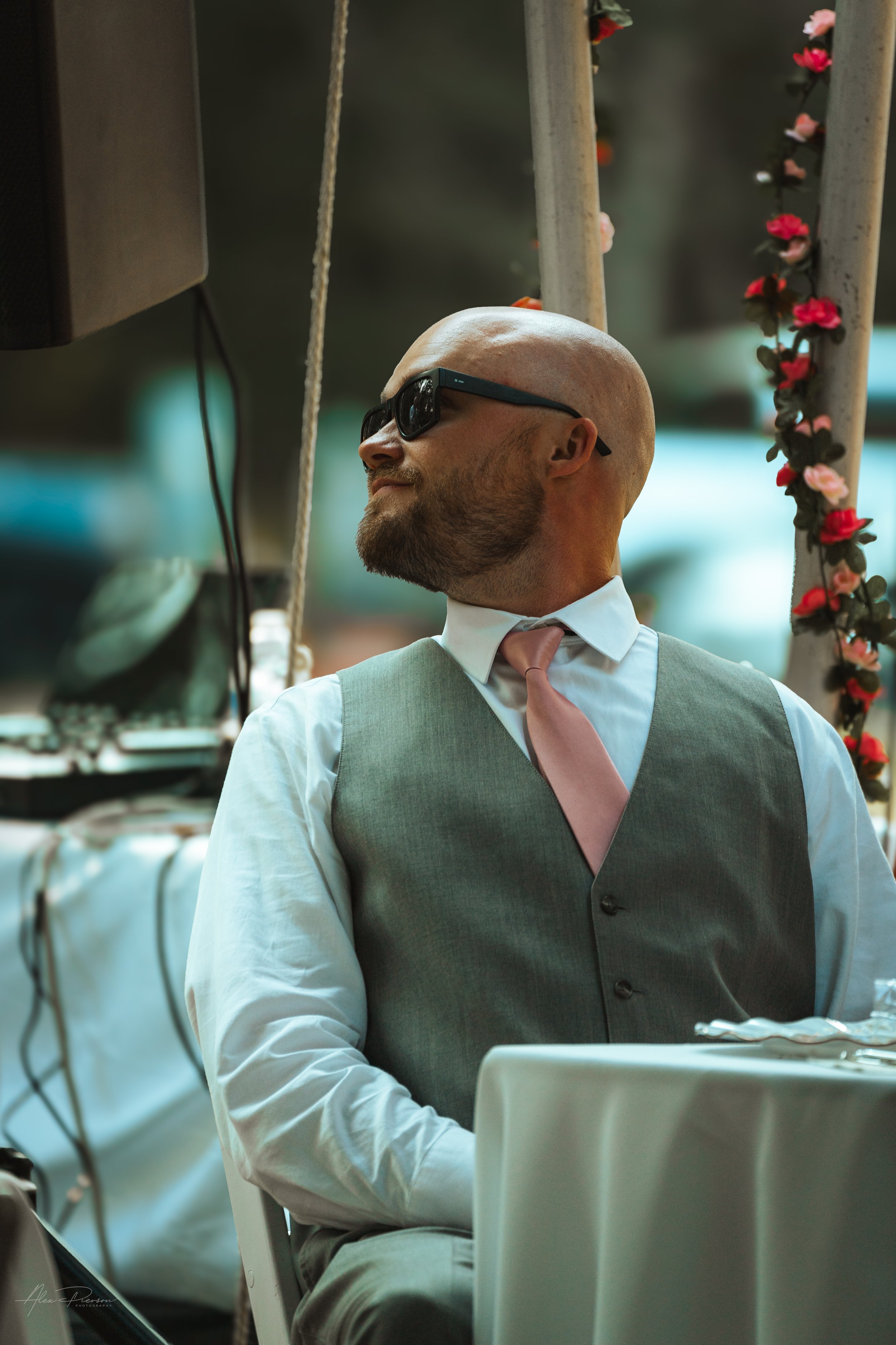 groom looking at his best man during his wedding in Olympia, wa