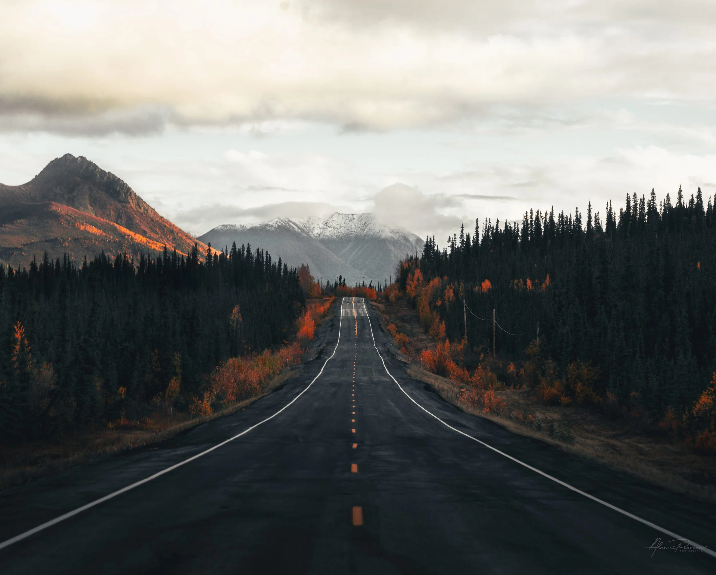 empty-road-alaska-highway-snow-capped-mountains-fall.jpg
