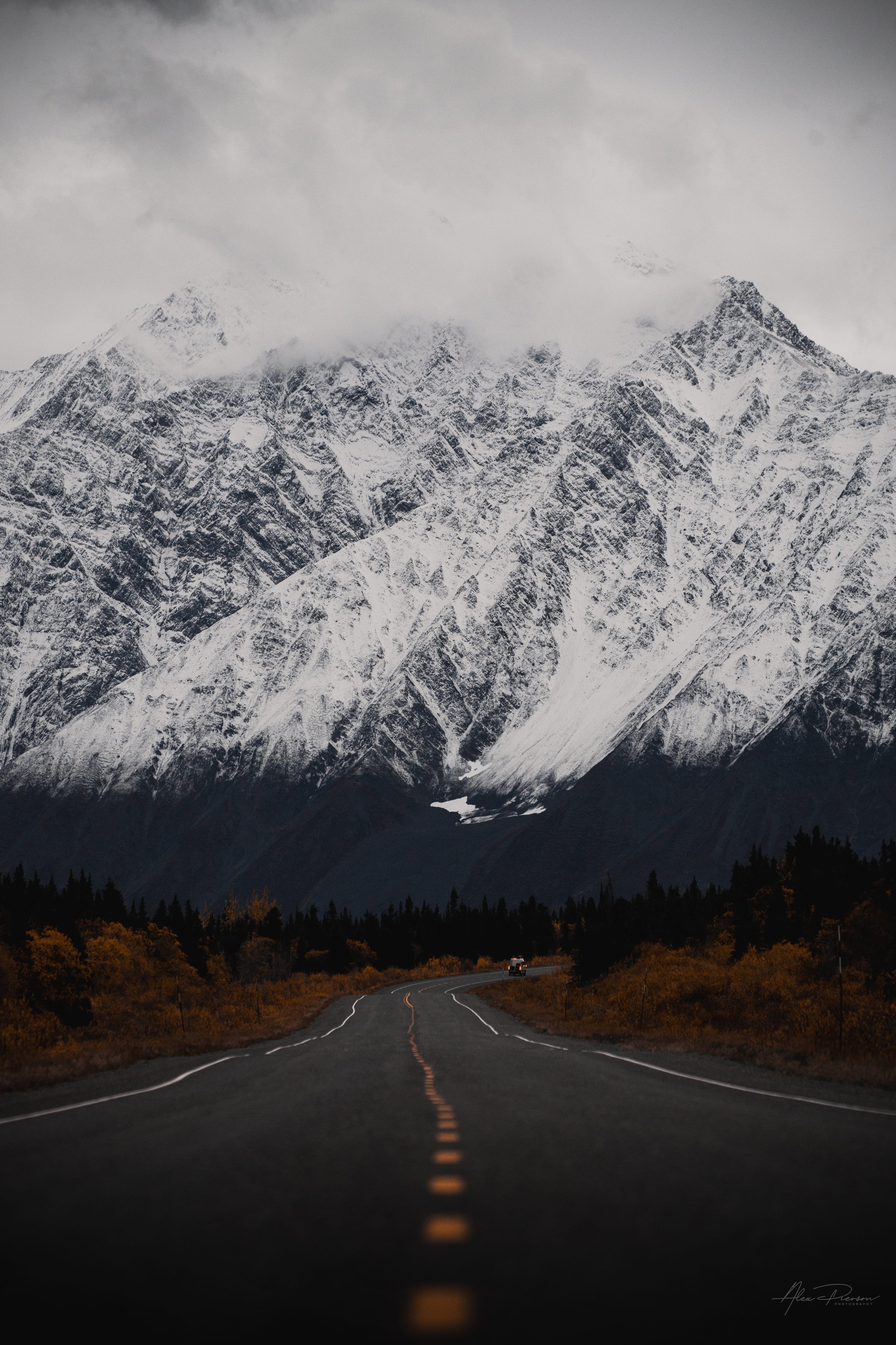 alaska-highway-leading-lines-snowy-mountain-range.jpg