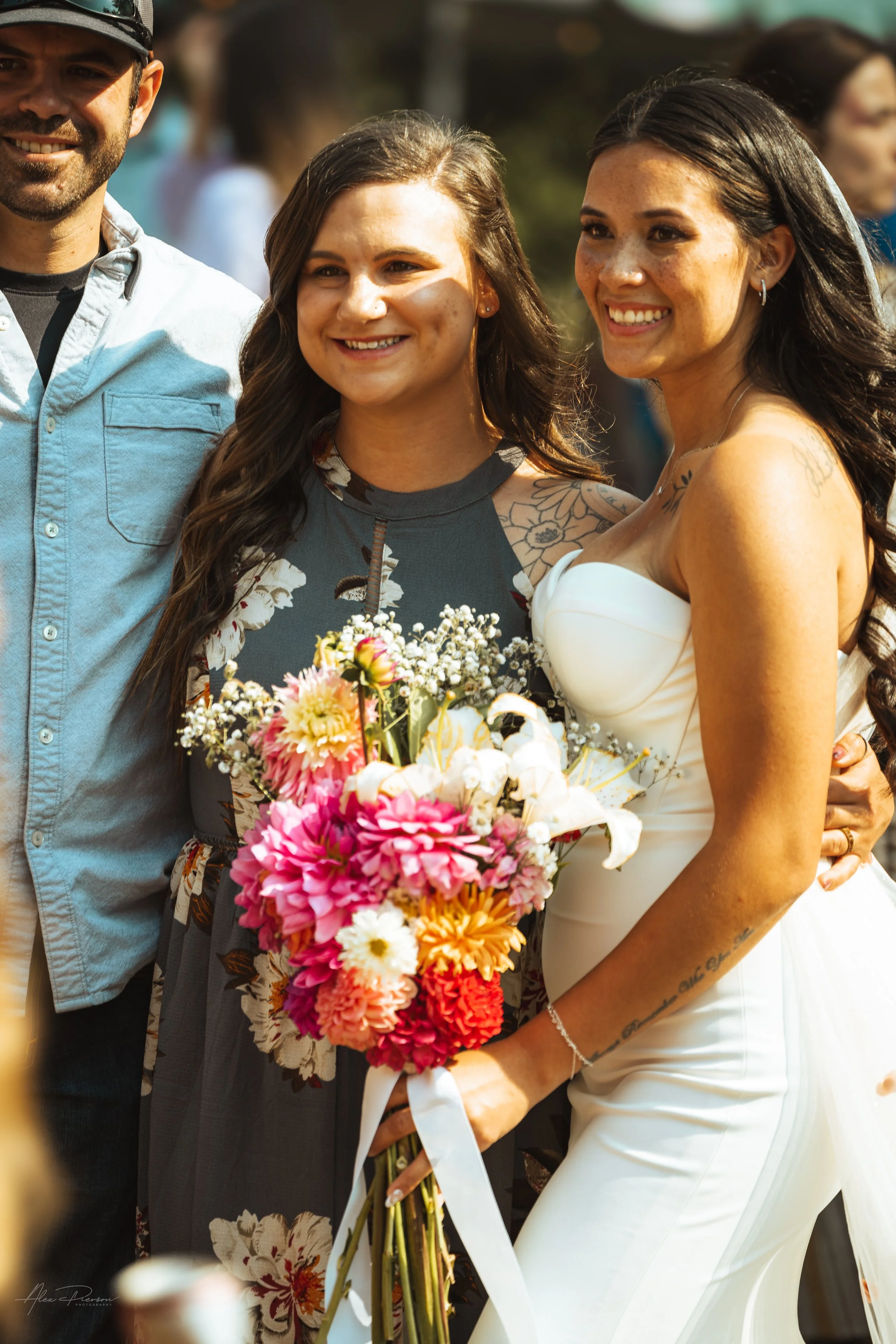bride and a guest posing during a wedding in Olympia, wa