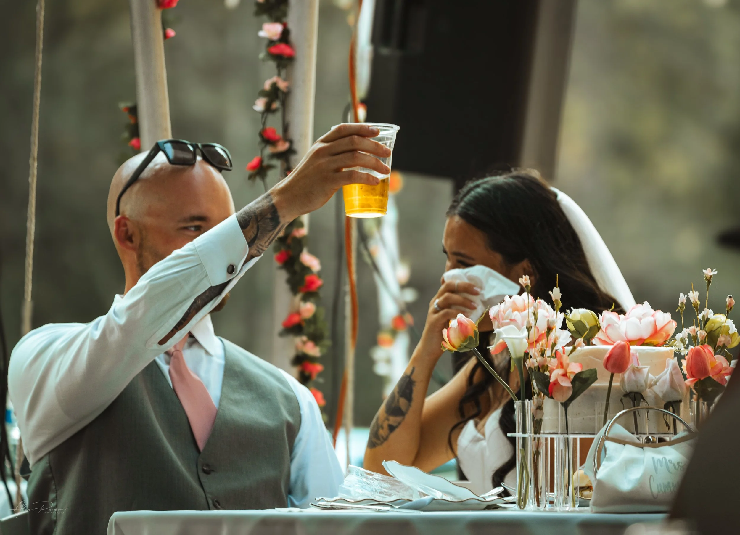 bride and groom having a toast during speeches at their wedding in Olympia, wa