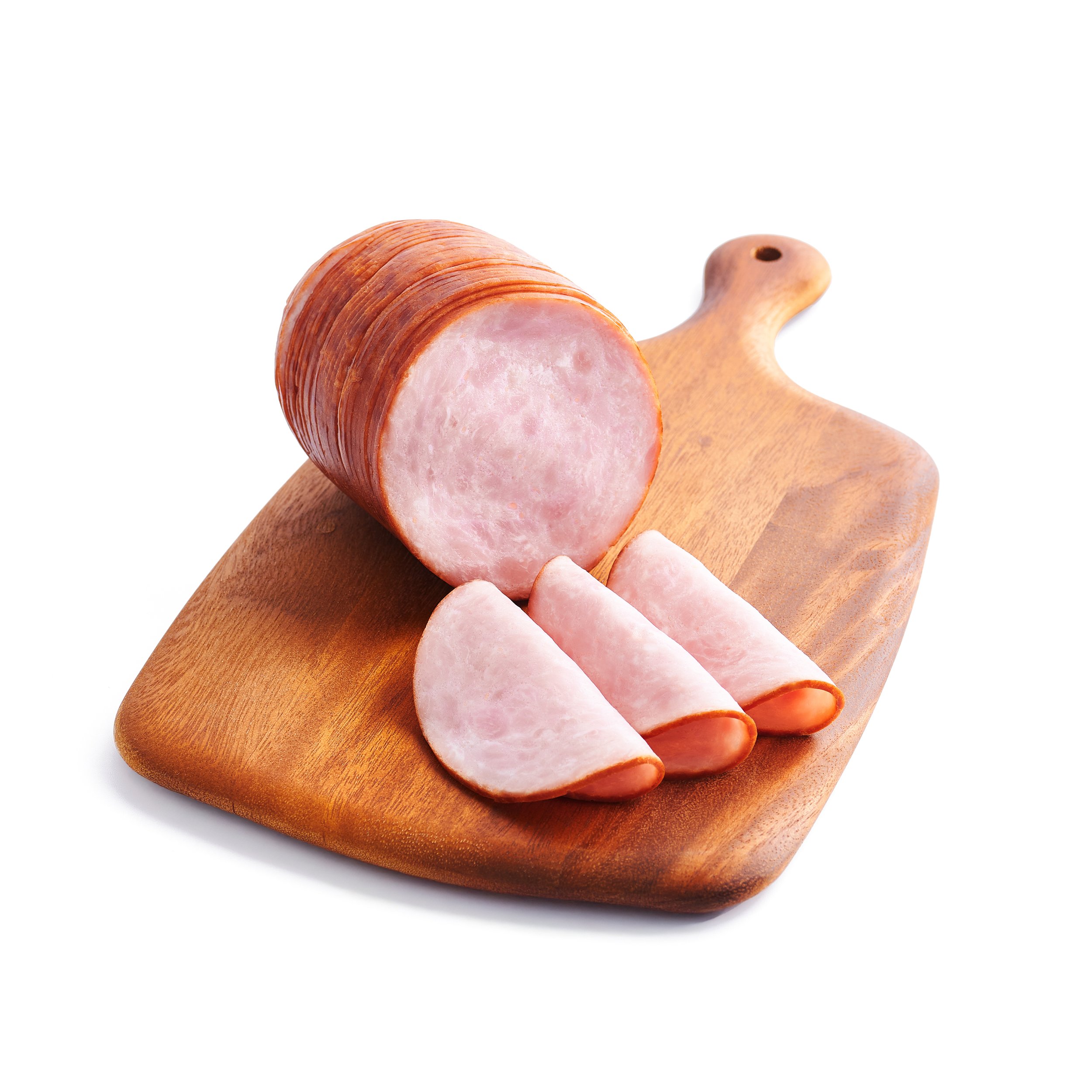 Slices of ham on a wooden cutting board.