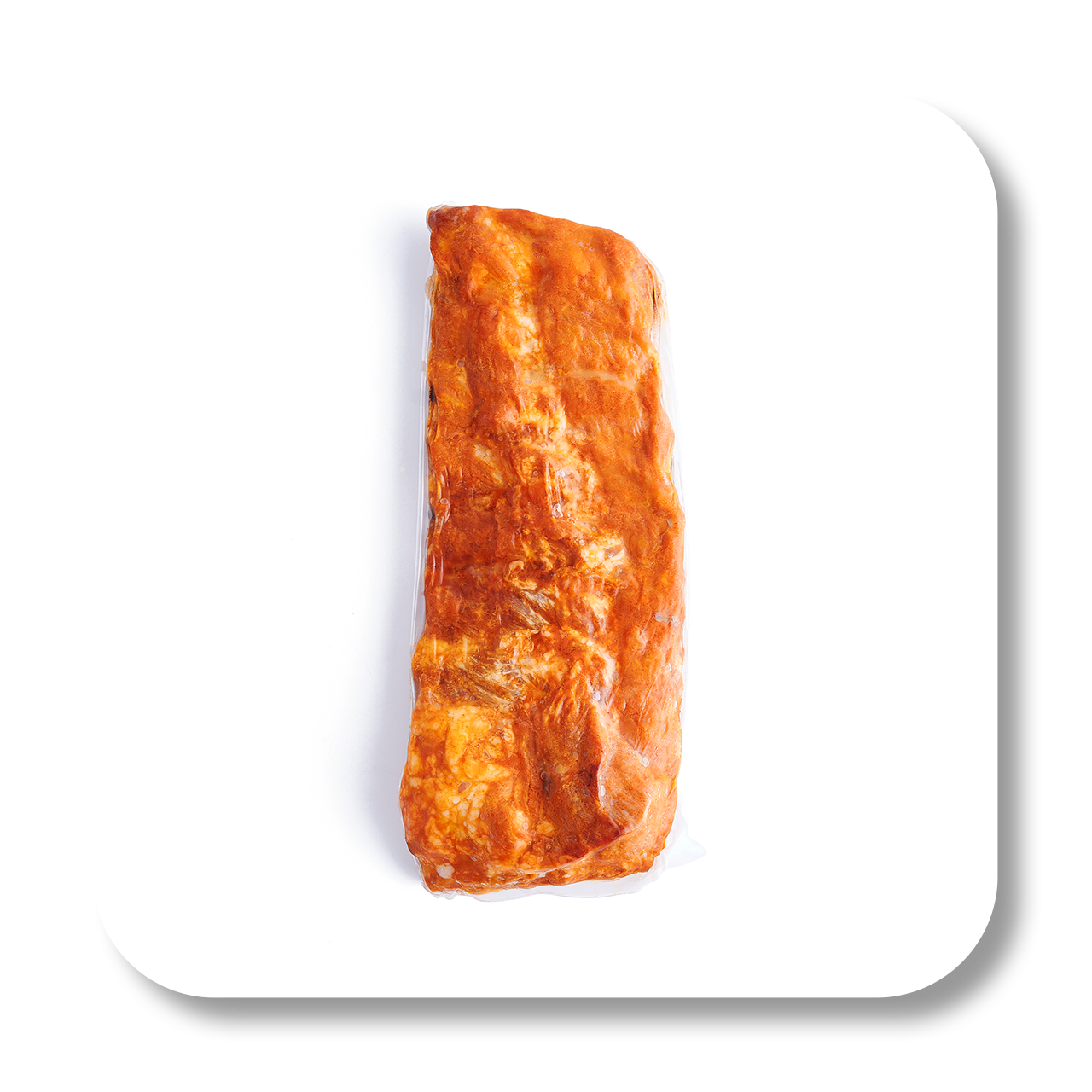 A piece of cooked salmon fillet with orange glaze, placed on a white surface.