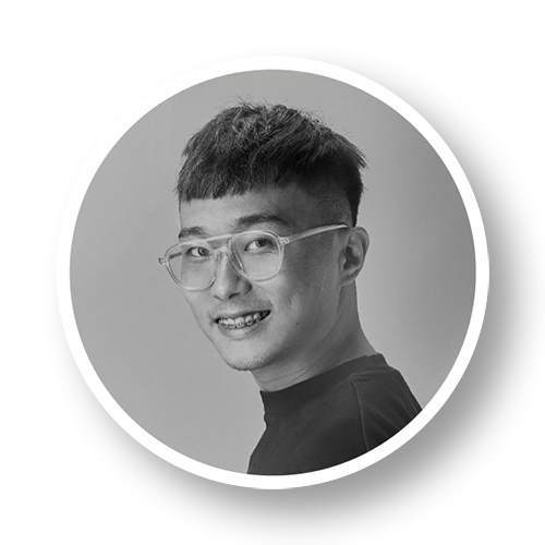 Portrait of a young man with glasses smiling, black and white photo, circular frame on a black background