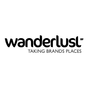 Black and white logo for Wanderlust, featuring stylized text and the tagline "Taking brands places."