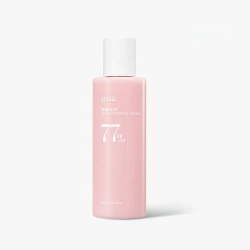 Pink bottle of Atulia Facial Conditioning Milk with a white cap, showing 77% on the label, on a plain white background.