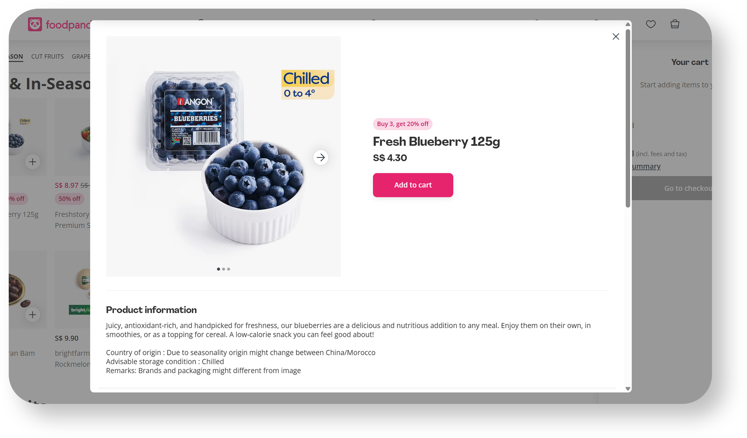 Image of a food product page showing fresh blueberries, including a plastic container and a ceramic bowl filled with blueberries. The page highlights that the blueberries are best enjoyed chilled at 0 to 4 degrees Celsius, with a price of S$4.30, and an option to add to cart. Product description emphasizes their freshness, antioxidant content, and that they are a nutritious snack. The image features the blueberries with a promotional pink sticker indicating buy 3, get 20% off.