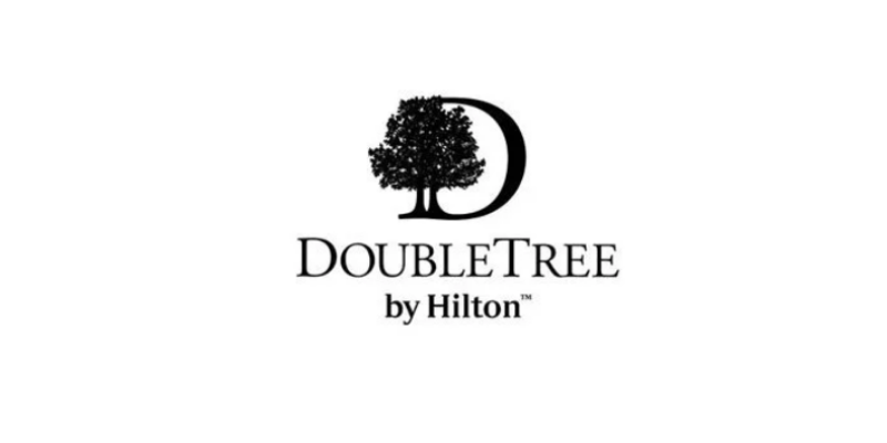 The logo of DoubleTree by Hilton features a stylized tree and a crescent moon, with the text 'DoubleTree by Hilton' beneath.