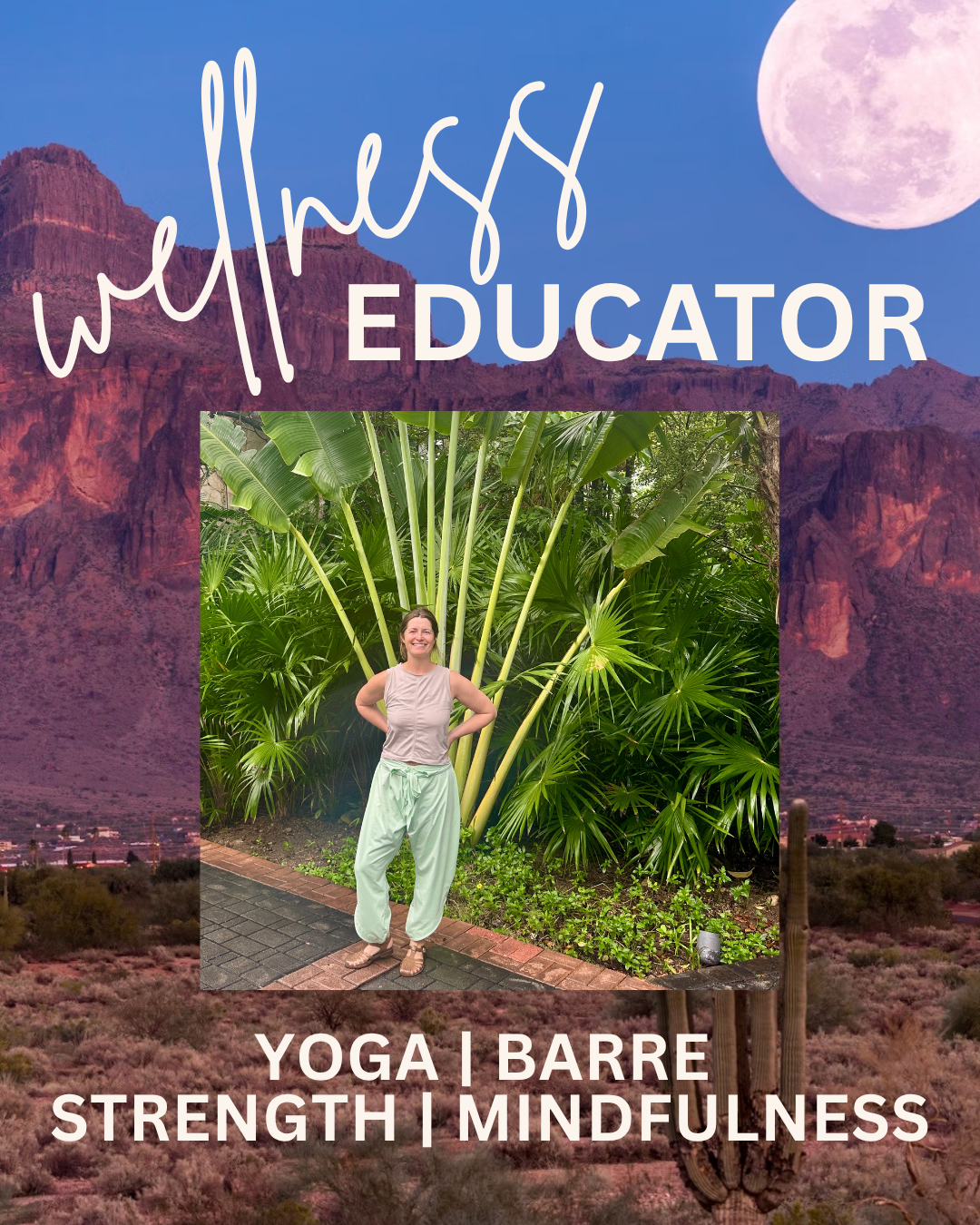 A woman standing outdoors in front of lush green tropical plants, smiling with hands on hips.