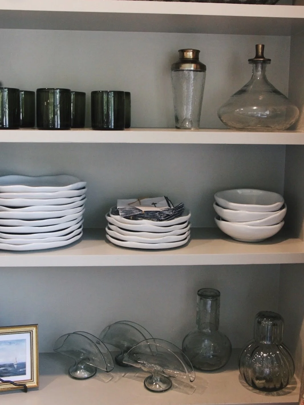 Stop by for some end of summer newness / new favorites 

1. Etched and fluted carafes for your bedside and glass napkin holders (bottom shelf 👀). Handmade by artisans in Mexico. 

2. Our new favorite plates &mdash; hand painted in Portugal but durab