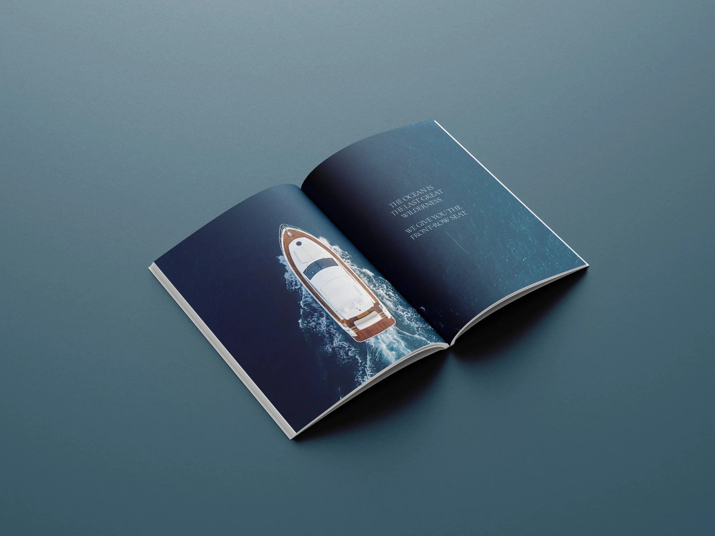 Editorial spread with inspirational quote and aerial yacht photography for The Art Of The Charter luxury yacht brochure designed by BCLR.