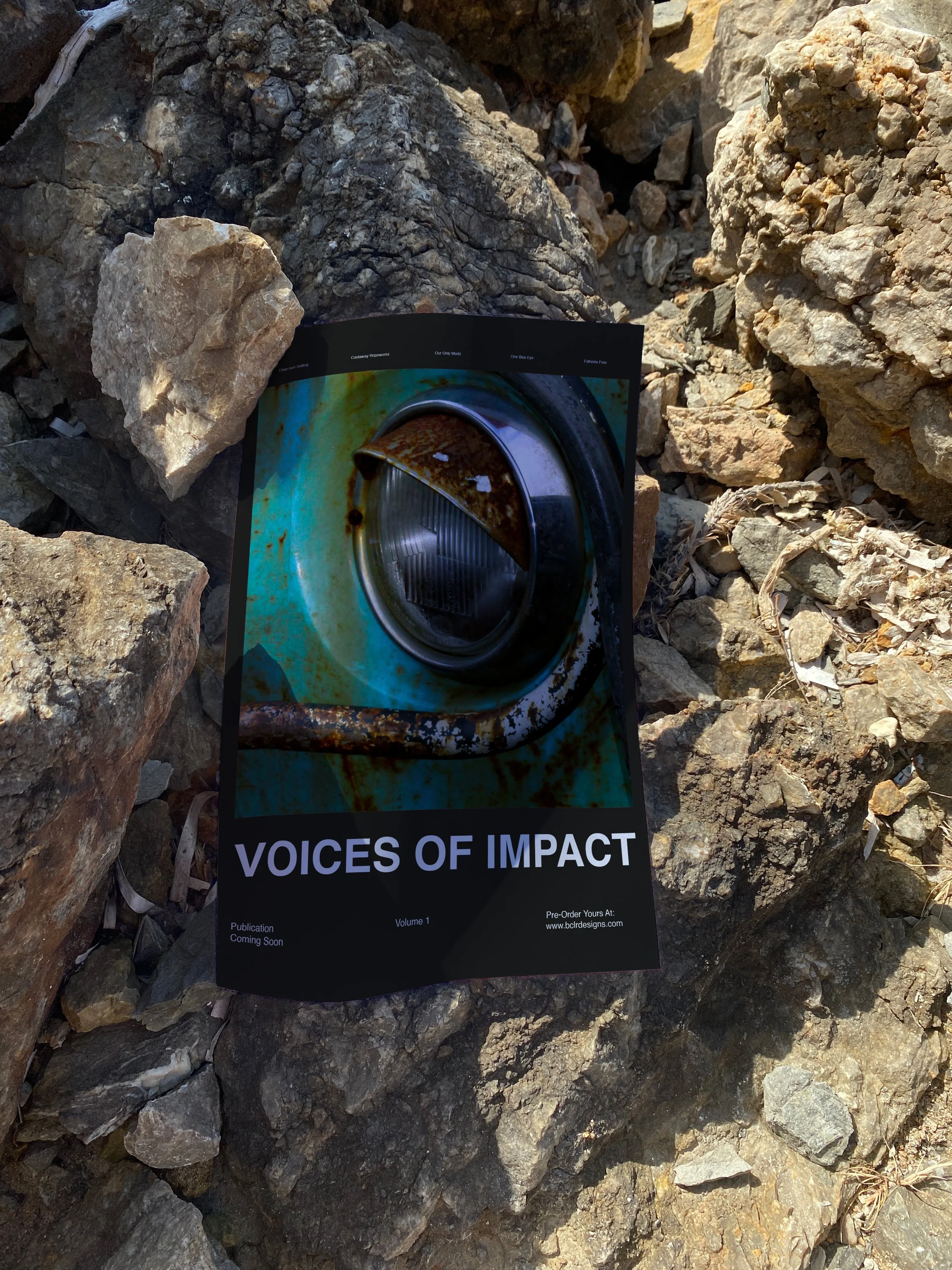 Voices Of Impact poster mock-up photographed on rocks, designed by BCLR.