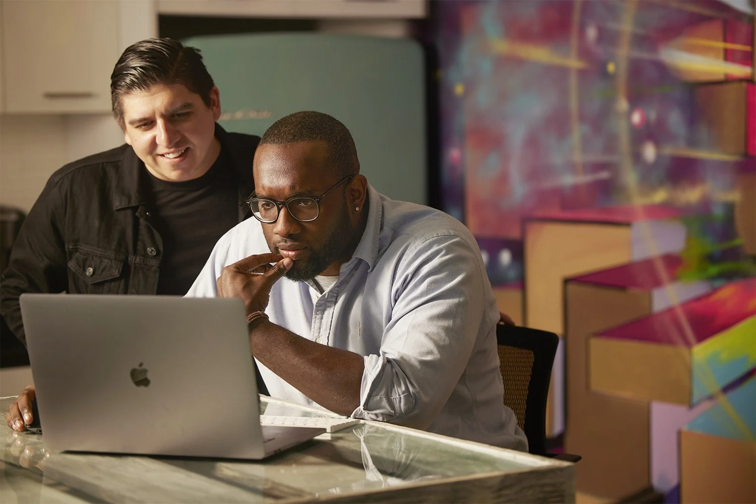 Engineers collaborating at Trinity Packaging Supply in Newport Beach during a corporate branding photography session photographed by Orange County photographer Alex Abercrombie.