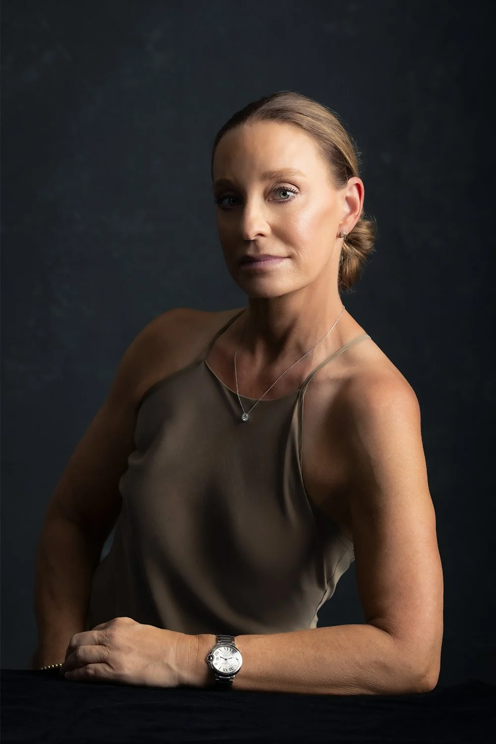 Portrait of Gena Wueste during the 40 Over 40 portrait series photographed by Newport Beach portrait photographer Alex Abercrombie in a studio setting.