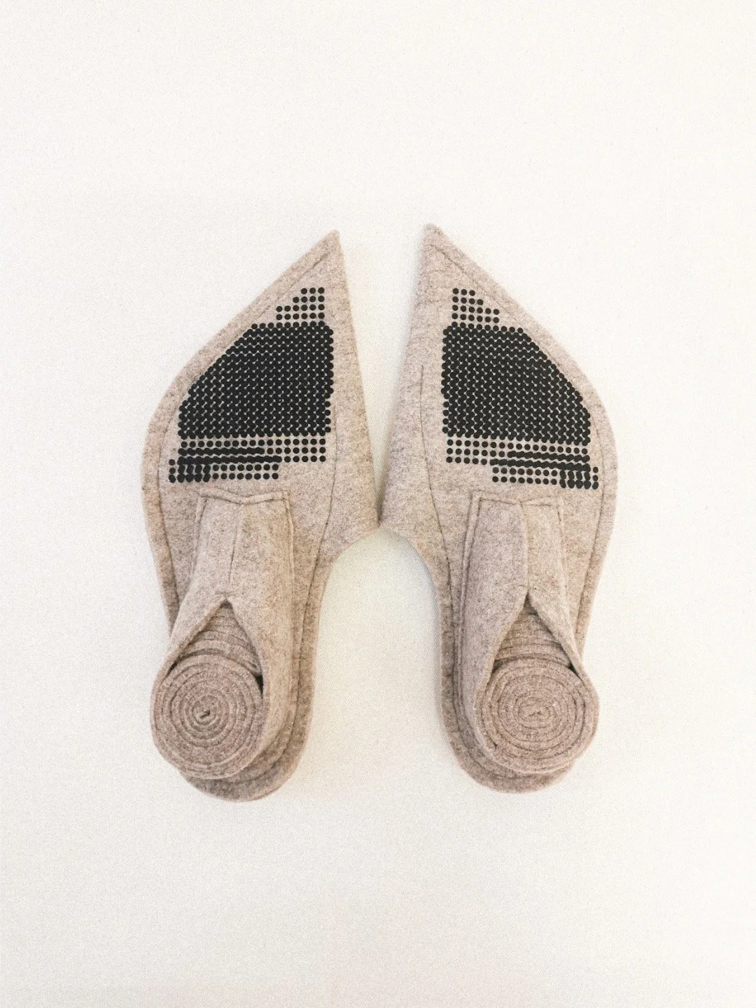 &ldquo;Slippers with heels?&rdquo; &mdash; Part II
The brief was simple:
Recycled felt.
No hard components.
No glue.
The challenge was not designing a heel.
The challenge was designing a heel from felt.
Many prototypes failed.
Some looked beautiful b
