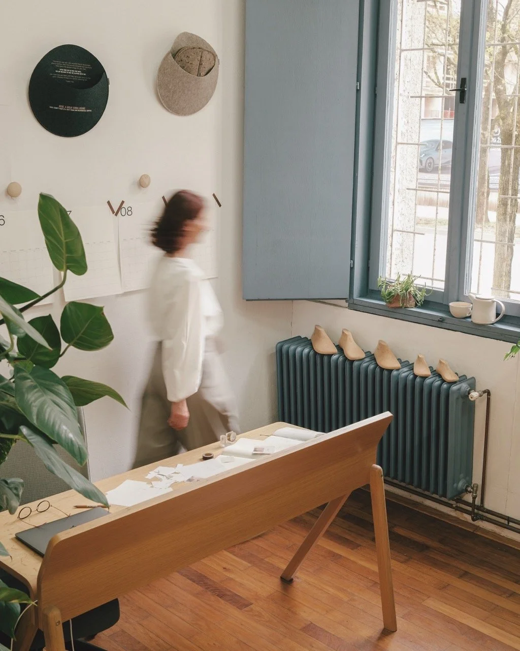 The quietest corner of our studio.
It may look peaceful, but I can still hear the rhythm of the studio.
Sewing machines. The music in the background. Conversations. Sketches, rulers, colourful threads and colleagues moving from one idea to the next.
