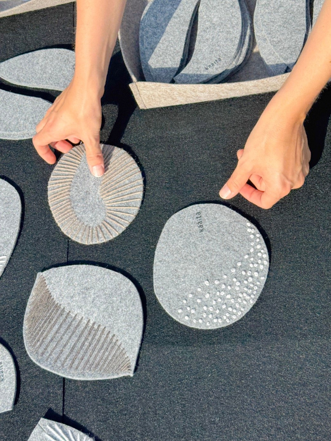 A table full of felt scraps left behind after cutting our slippers.
@sarasmid stitched a few ideas.
Everyone else stitched their own.
Thank you for spending a sunny afternoon with us on the lawn in front of @hotel.bohinj. We loved seeing every piece 