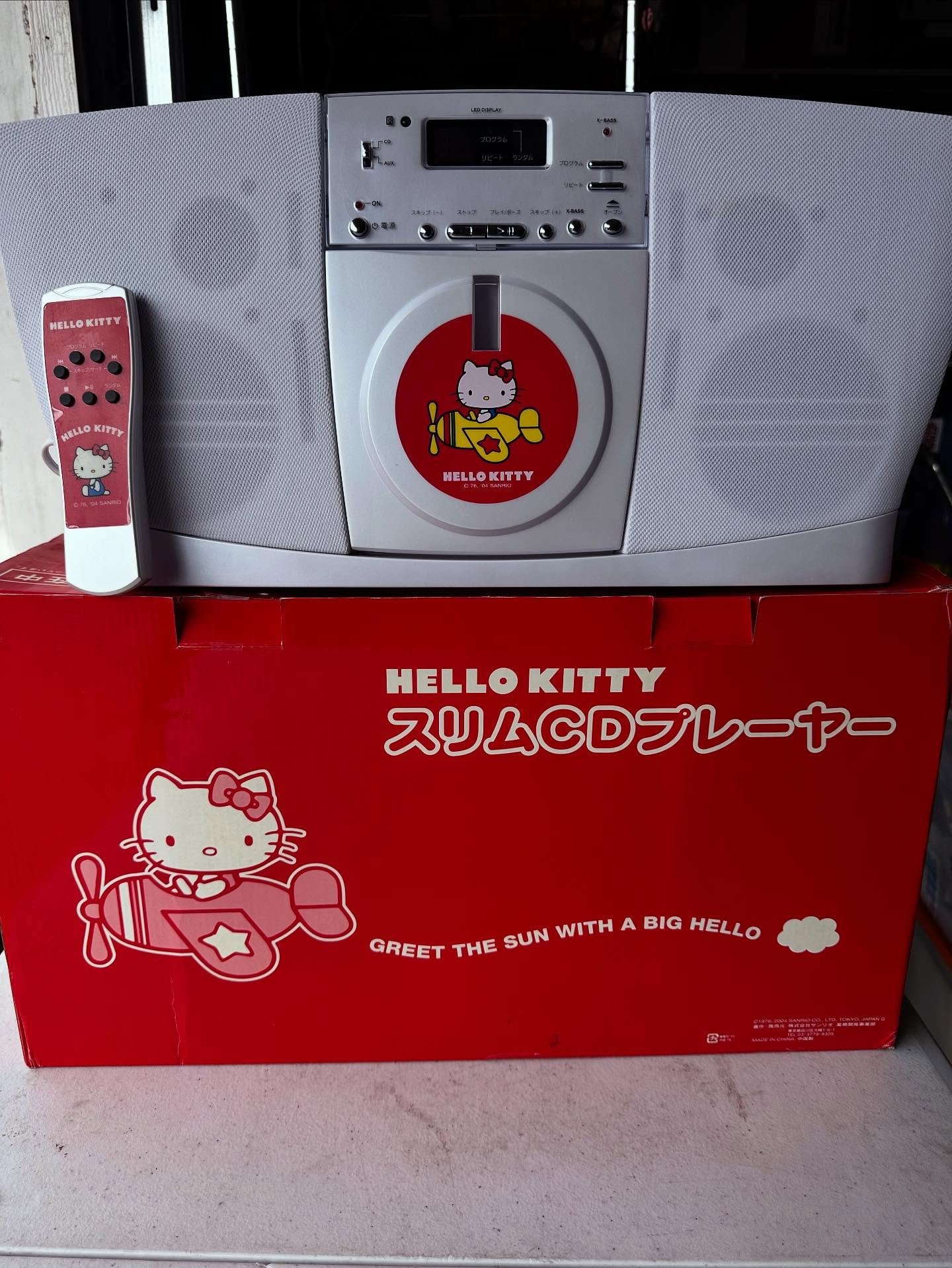 Near mint slim #hellokitty CD player. With box, remote, and cord. It was in the original plastic and boxed until i opened it to test. Super great item from 2003. Even mounts to the wall if ya wanted! DM if interested, i ship!!