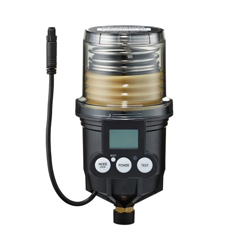 Yksipisteannostin rasvavoiteluun tärinäohjauksella