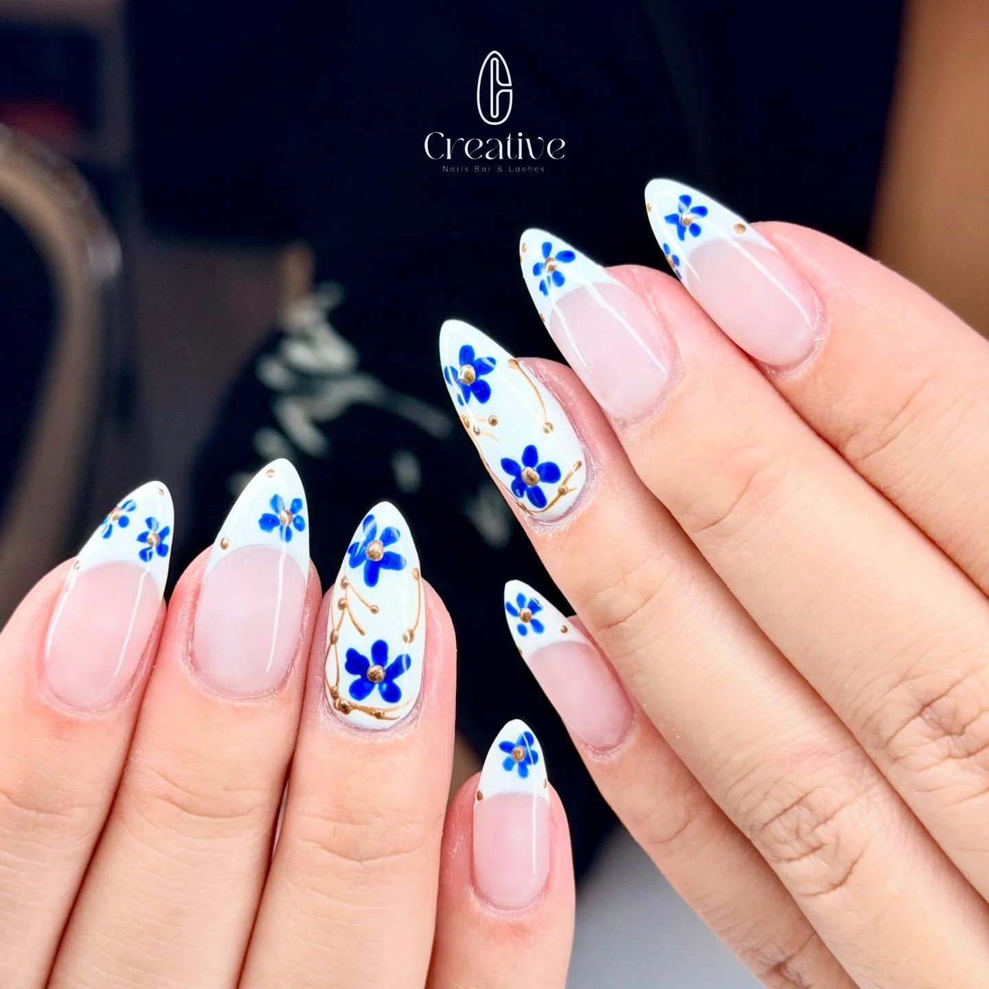 Blue flowers + French tips = the prettiest combo 💙🌼

✨ Welcome Offer ✨
New here? Enjoy $10 OFF your first visit 💅 when you book services $50+!
(One-time use &bull; First-time customers only &bull; Cannot be combined with other offers 🫶) 
✨ Get pa