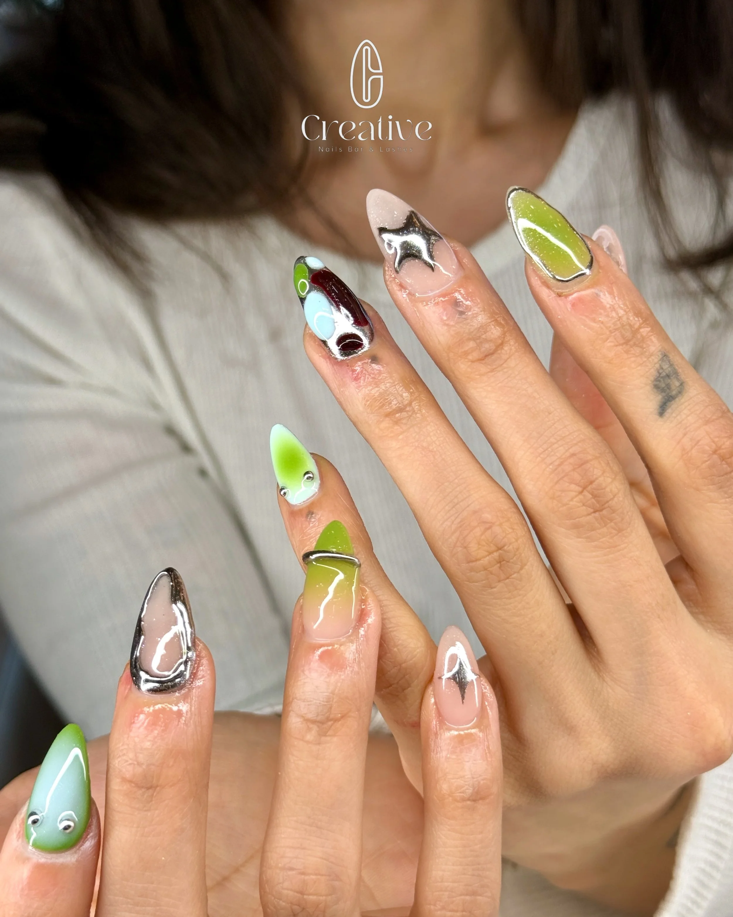 Chrome details, playful shapes, and a pop of lime green 💚✨
A statement set that&rsquo;s impossible to ignore.

💫 Structured with dimension
🪩 Futuristic chrome accents
🍈 Fresh spring-inspired tones

Nails by Lia 🤍

✨ Welcome Offer ✨
New here? Enj