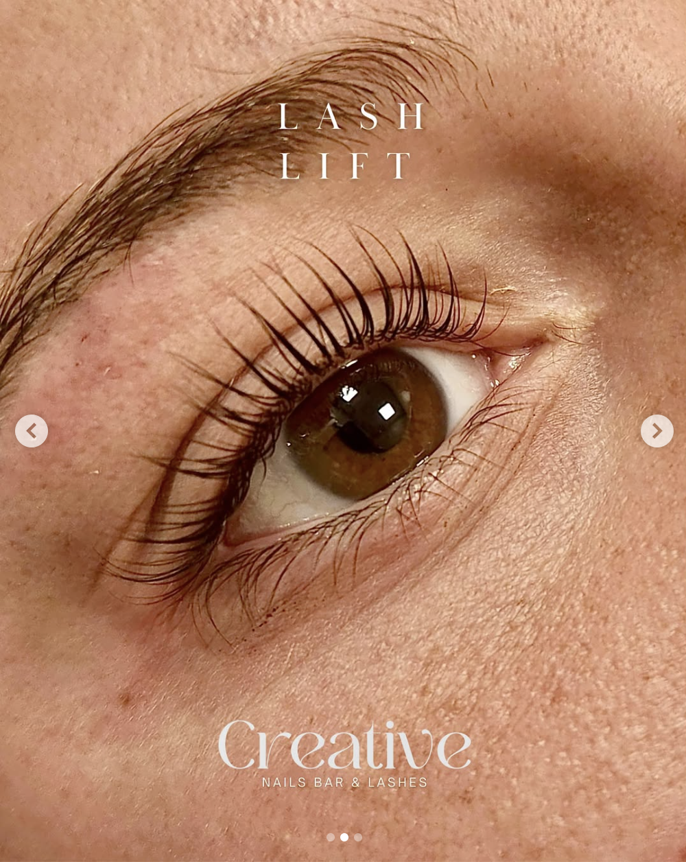 Close-up of a brown eye with long eyelashes, promoting lash lift services at a nail bar and lash studio.