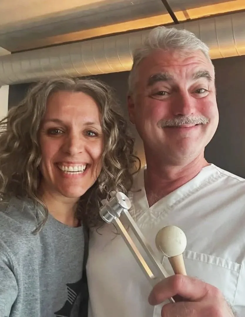Happy client after receiving reiki and Om tuning fork placements.