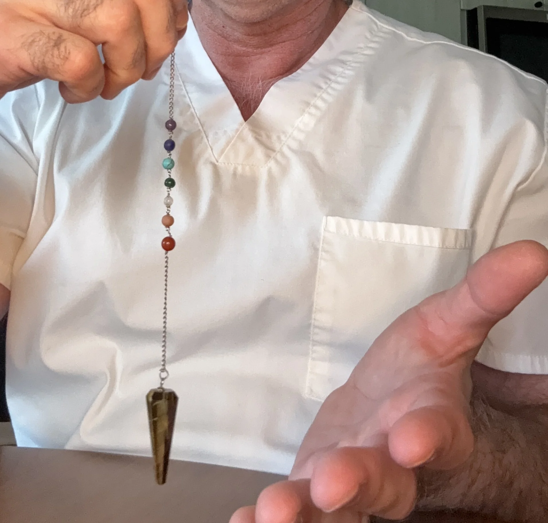 Chakra pendulum reads the energy from your energy field to know where to point on the charts.