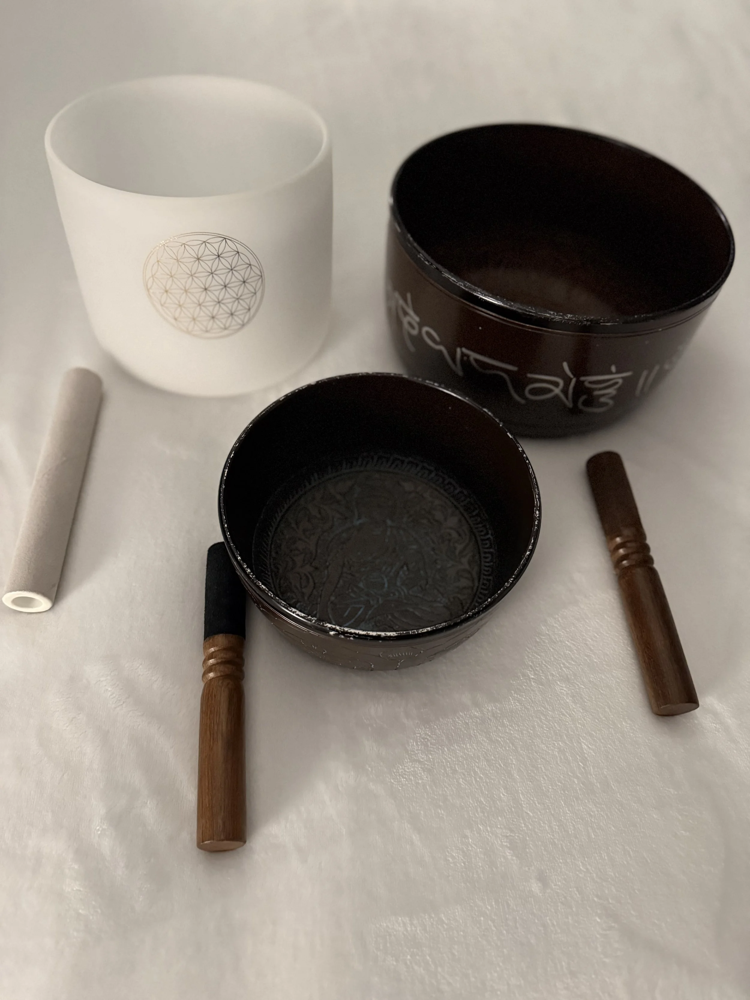 Sessions include the use of sound healing tools such as singing bowls.