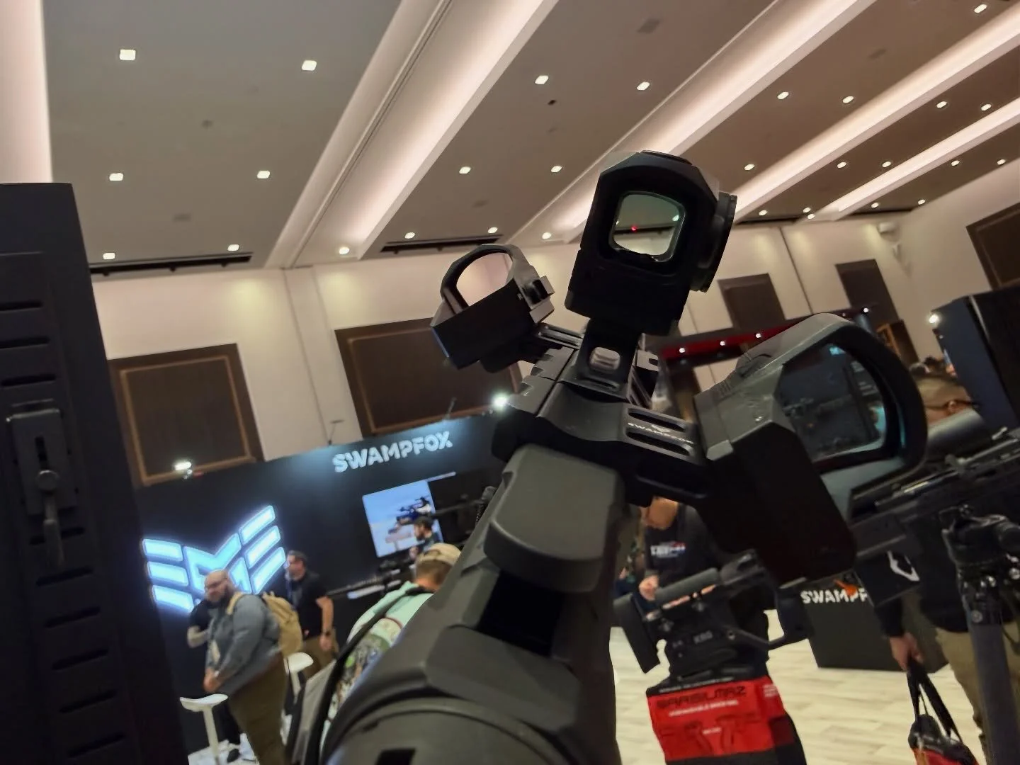 All them optics and you would still find a way to miss #shotshow #2a #guns #reddot #rifle