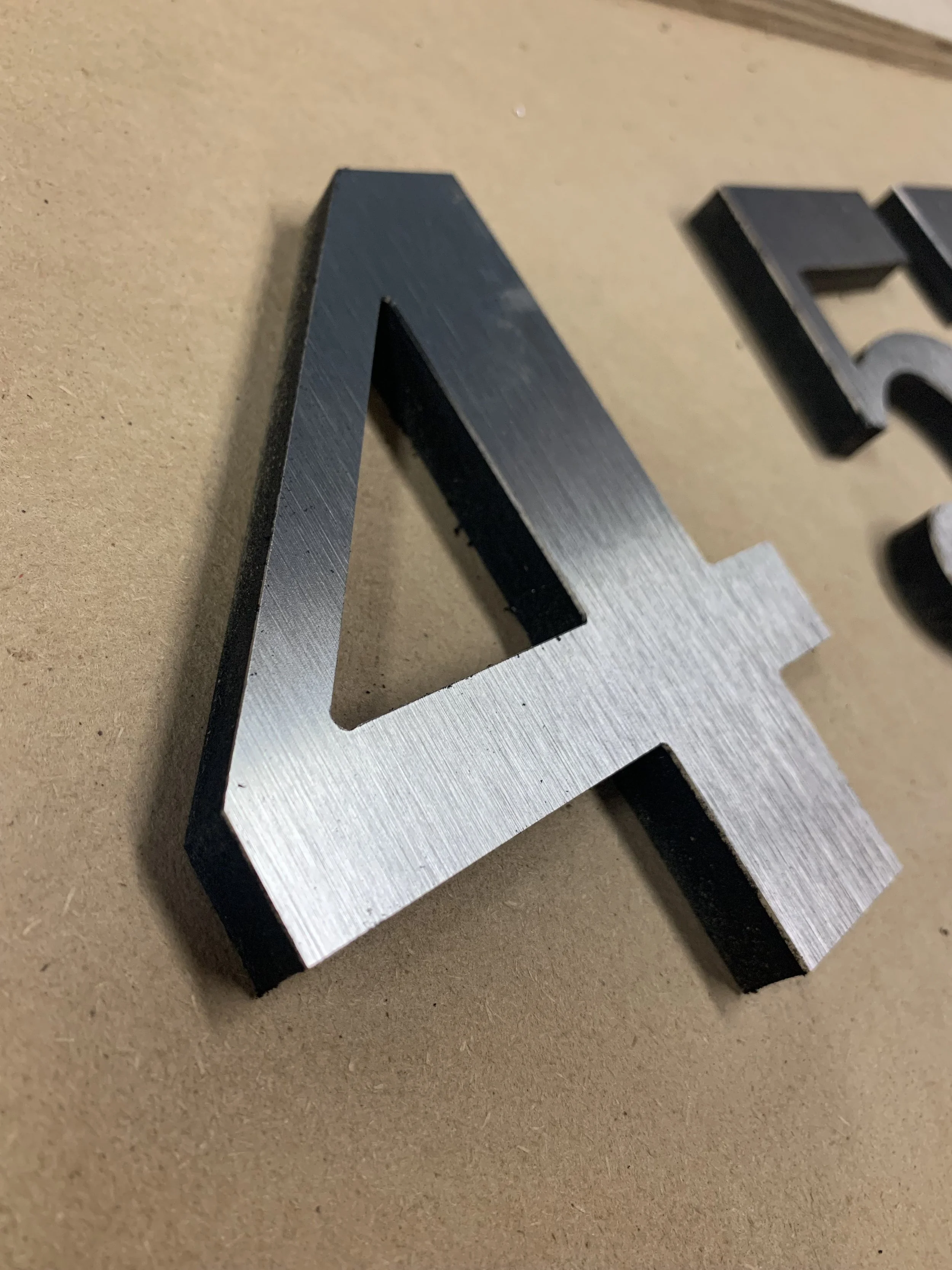 Routed Chrome Letter.jpg