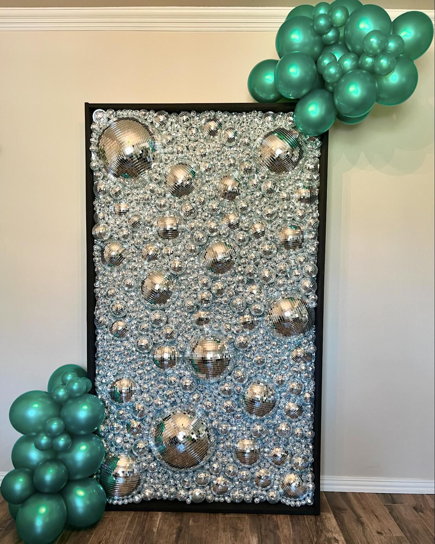 disco wall and balloon clusters