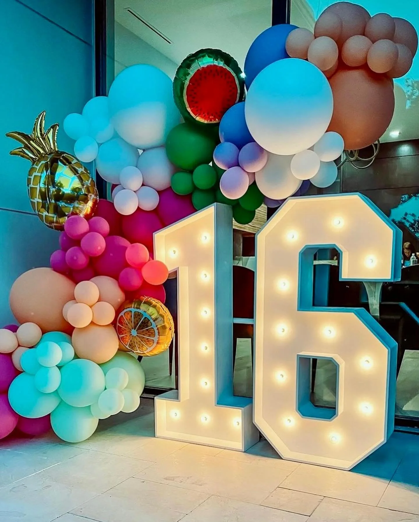 marquee number and balloon garland with foils
