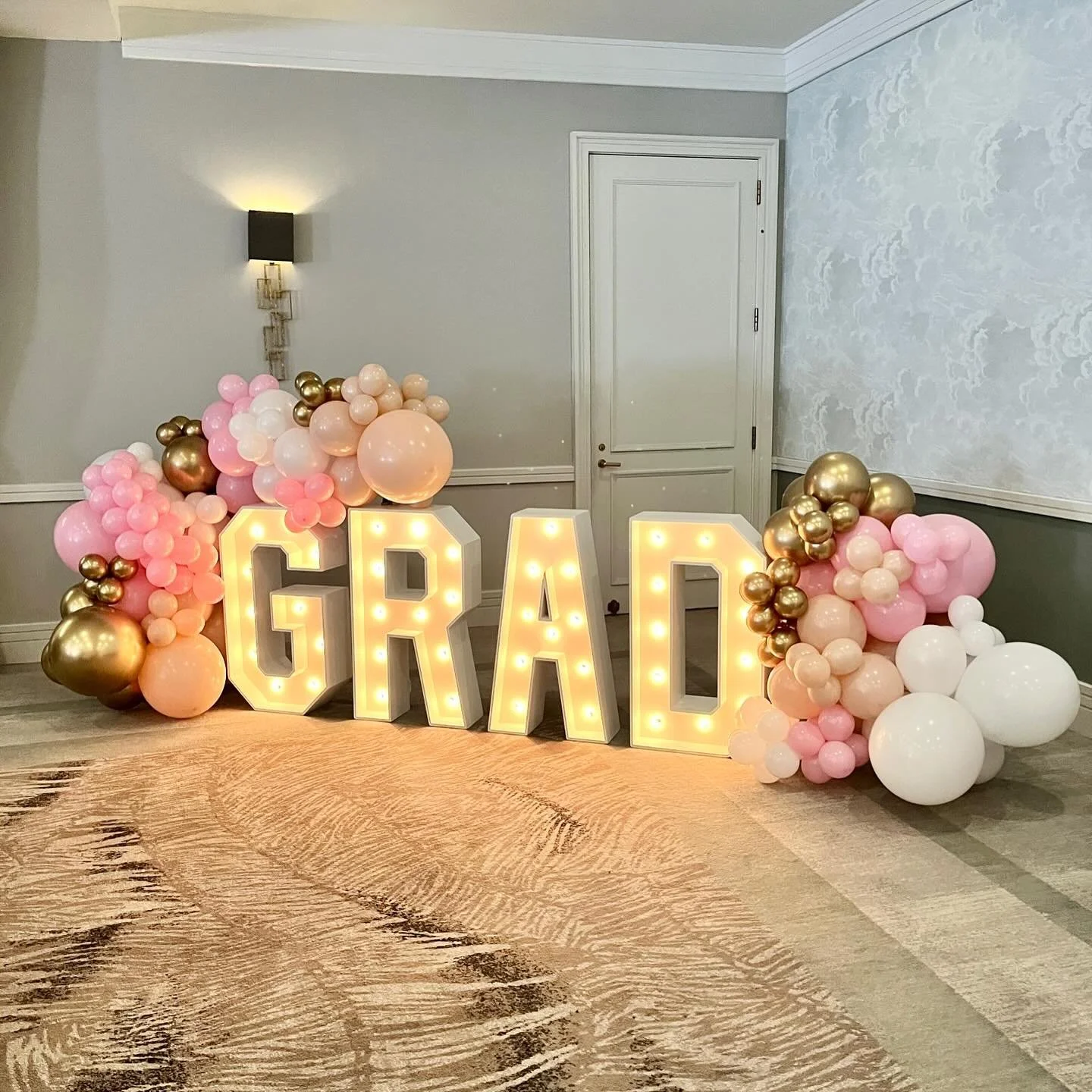 marquee letters with balloon garland/clusters