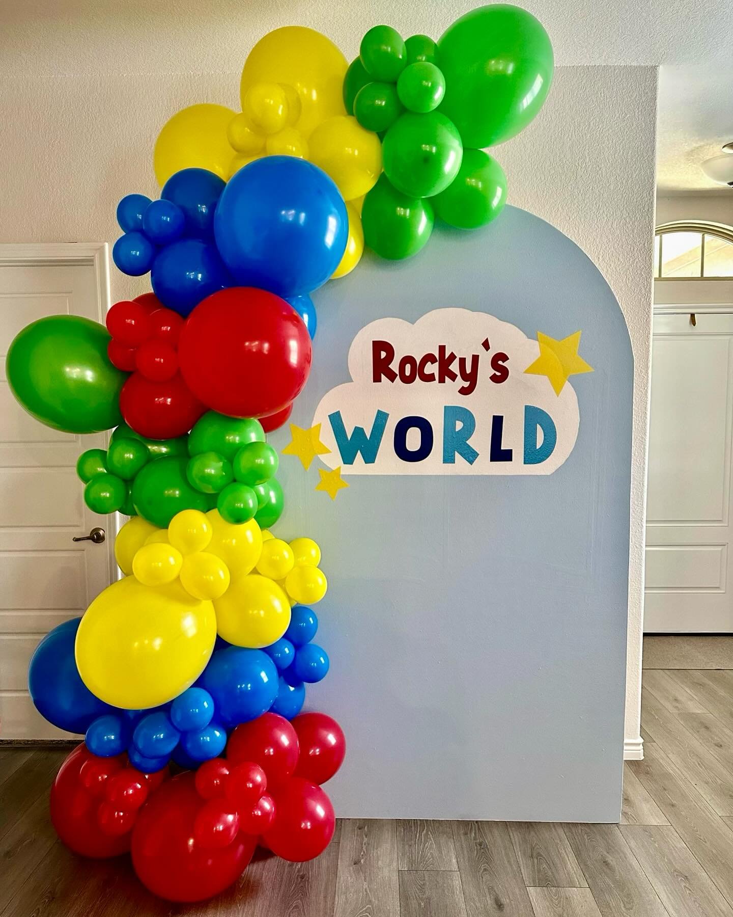 7x4 wood arch backdrop with vinyl and 8-10 ft balloon garland