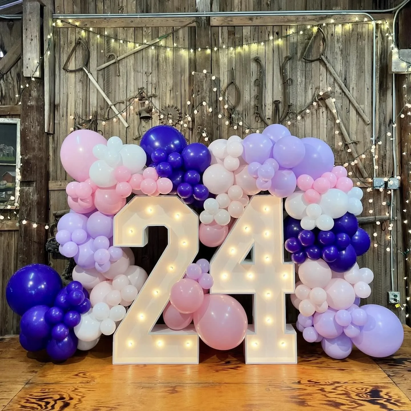 marquee numbers with balloon garland