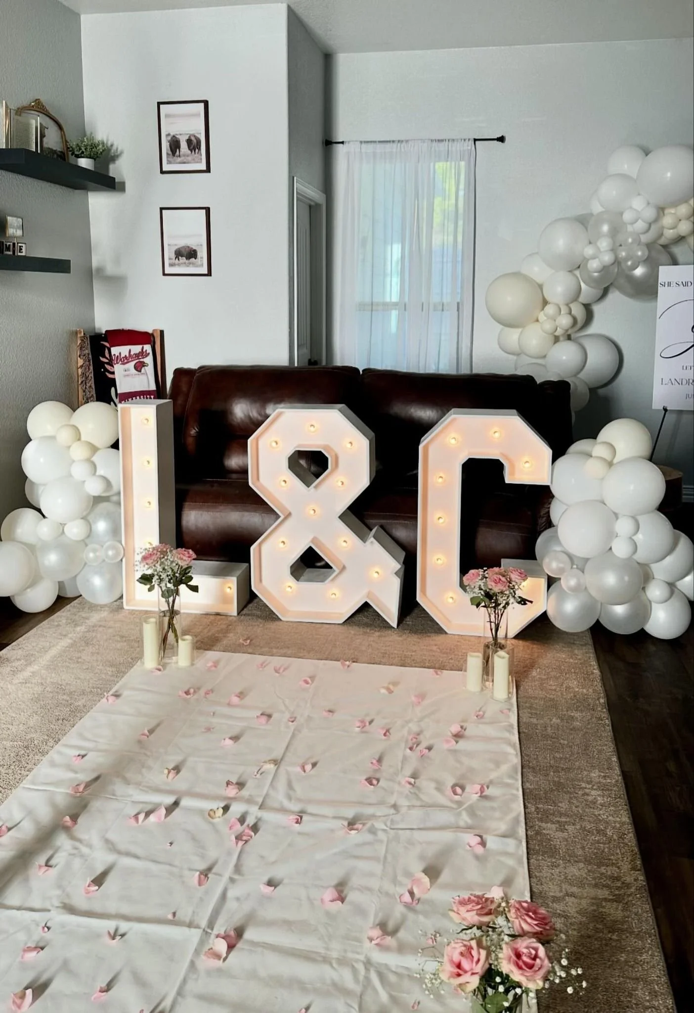 marquee letters with balloon clusters and 8-10 ft balloon garland