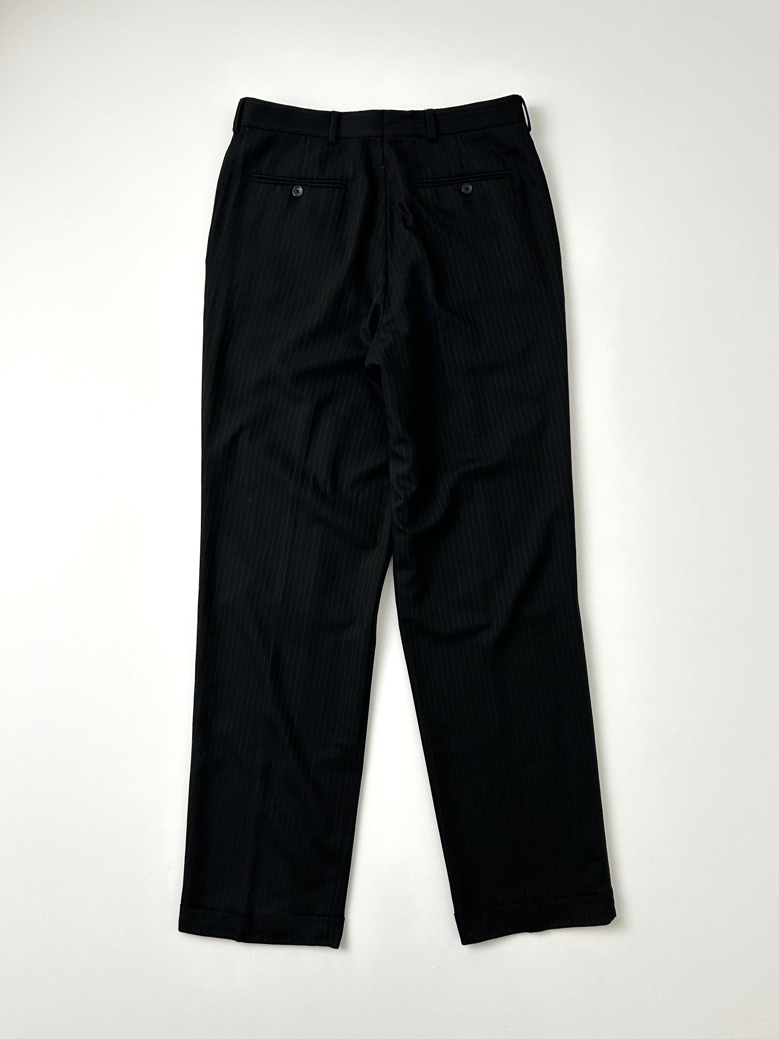 EMANUEL by Emanuel Ungaro black pinstripe trousers. Flat front with cuffs. Super soft summer weight 100% wool.