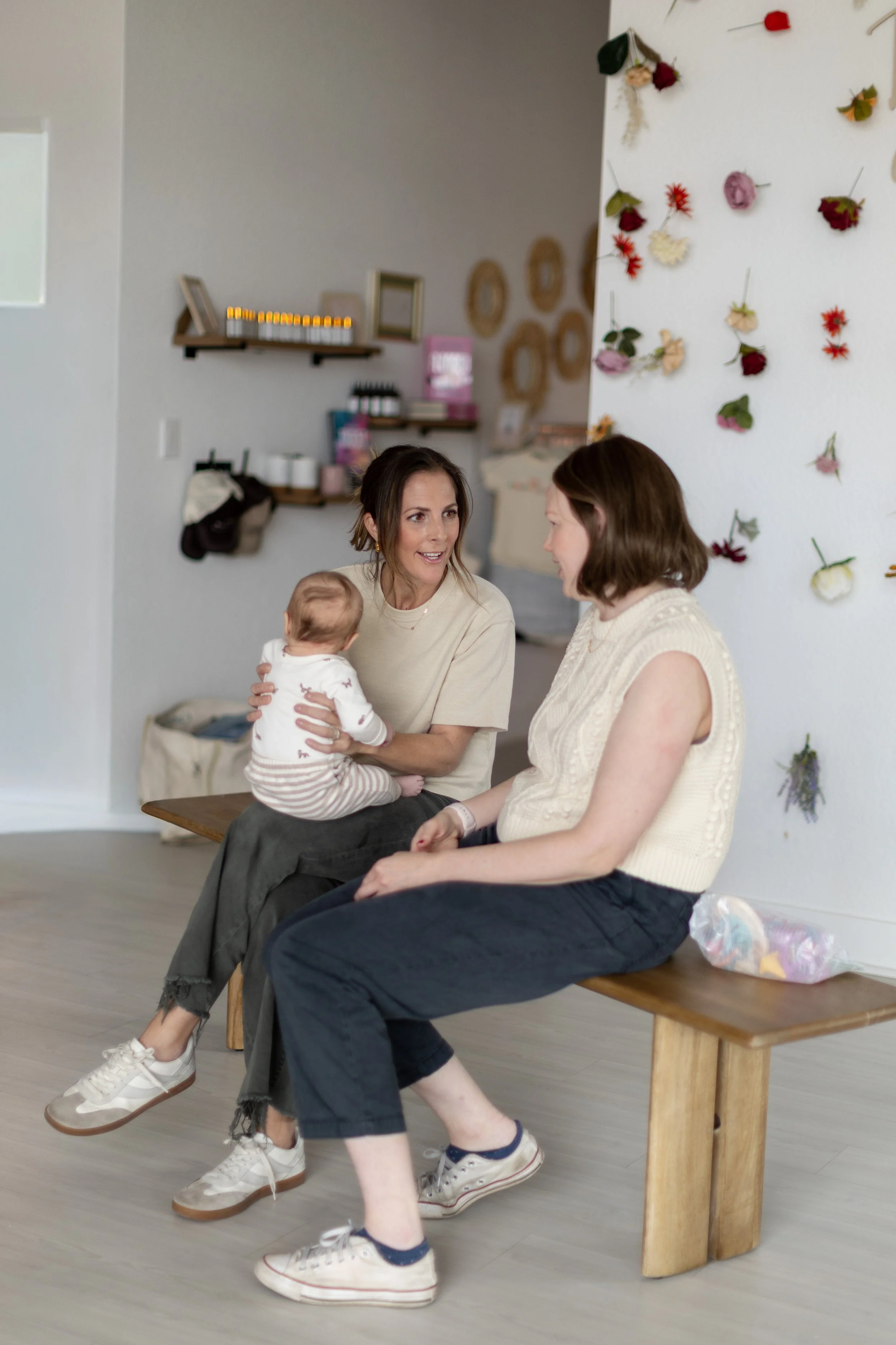 Dr. Nicole discussion torticollis with infant's caregiver