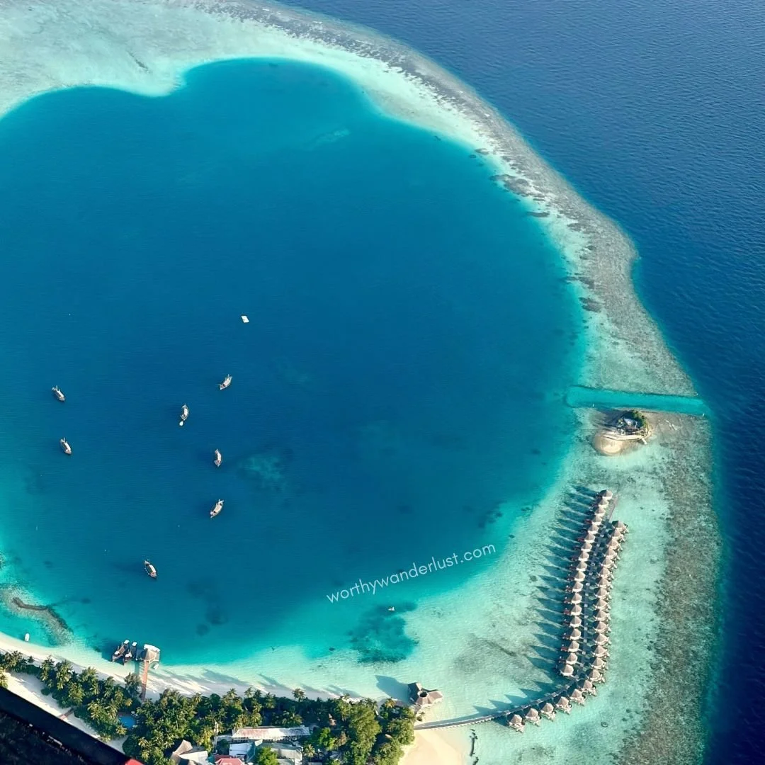View of ocean and a Maldivian resort from seaplane