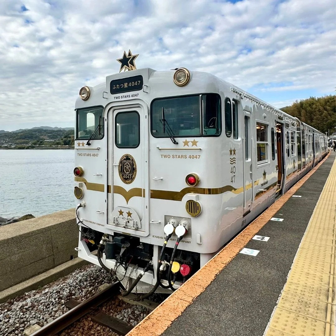 Two Stars 4047 train in front of the Kyushu sea