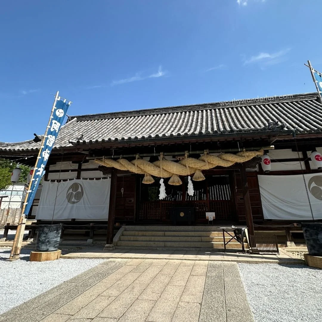 Achi shrine on a clear day with blue skies